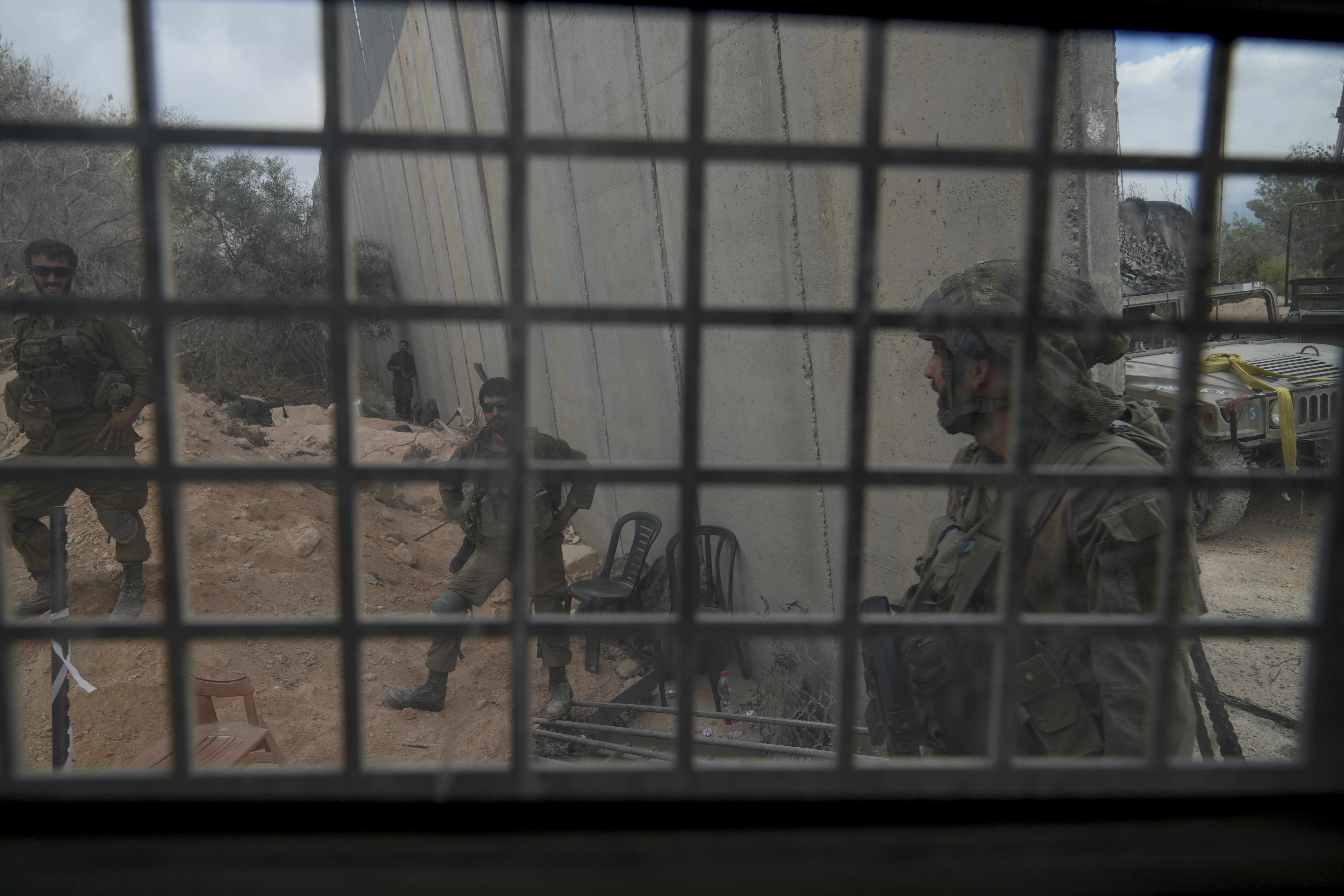 Israeli soldiers are seen during a ground operation in southern Lebanon, near the border with Israel, Sunday, Oct. 13, 2024. (AP Photo/Sam McNeil)