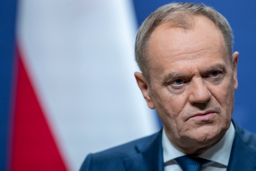 FILE - Poland's Prime Minister Donald Tusk pauses as he speaks, during a news conference following his meeting with Lithuania's Prime Minister Ingrida Simonyte at the government's headquarters in Vilnius, Lithuania, on March 4, 2024. (AP Photo/Mindaugas Kulbis, File)