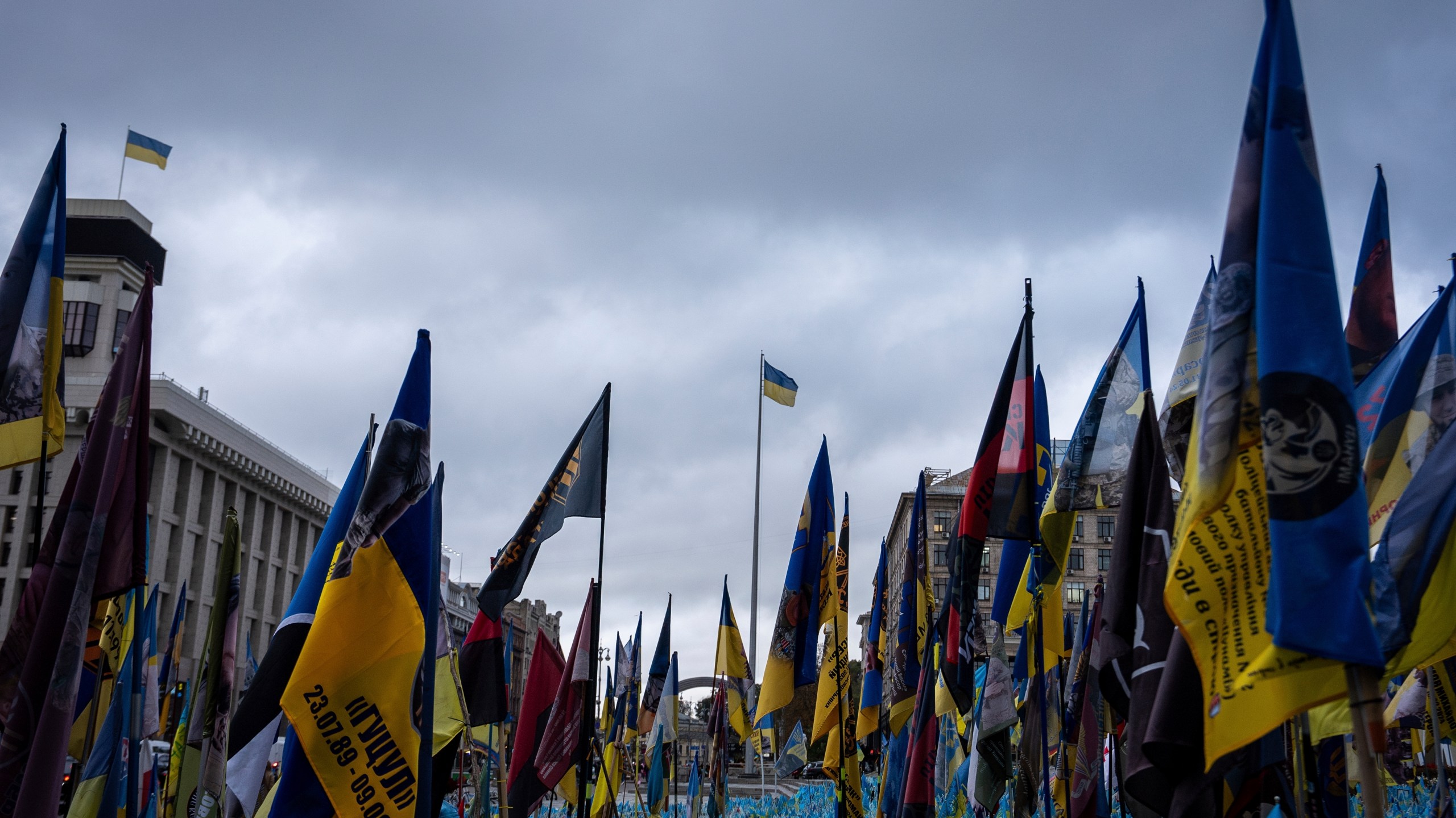 Flags placed in honour of fallen servicemen flutter in the wind in central Kyiv, Ukraine, Monday, Oct. 14, 2024. (AP Photo/Alex Babenko)