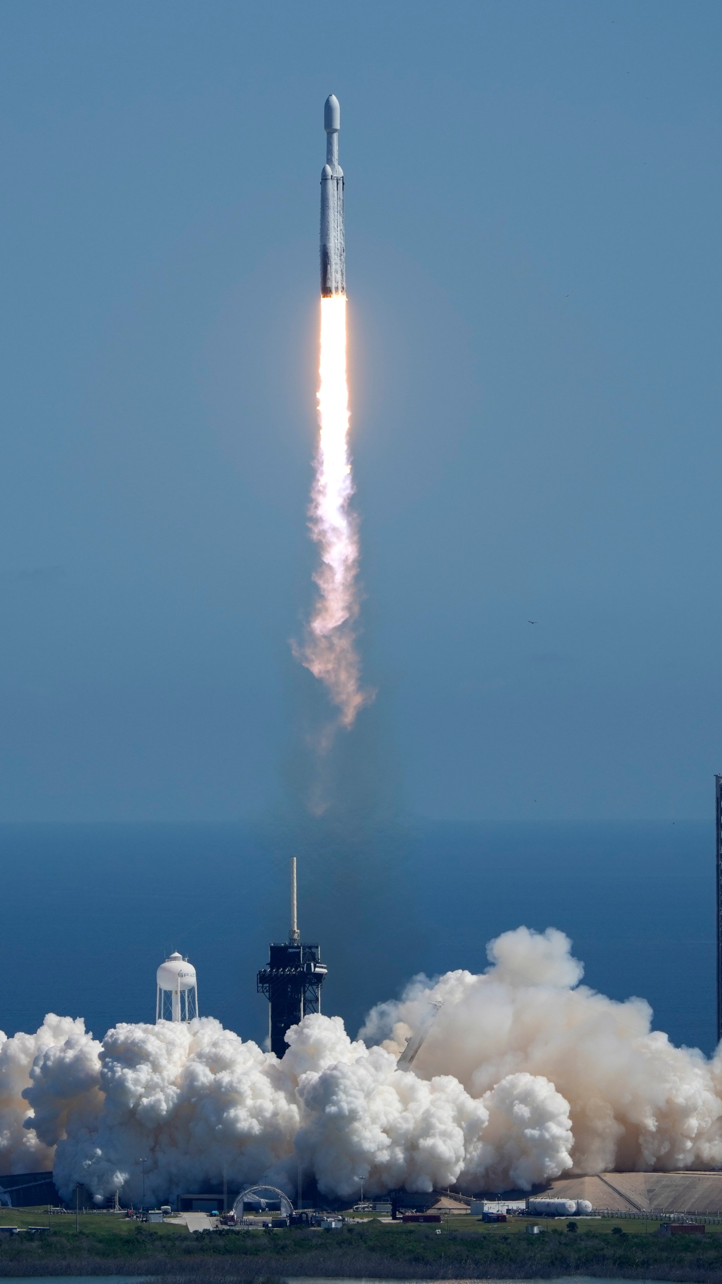 A SpaceX Falcon Heavy rocket with a NASA spacecraft bound for Jupiter lifts off from pad 39A at the Kennedy Space Center Monday, Oct. 14, 2024 in Cape Canaveral, Fla. (AP Photo/John Raoux)