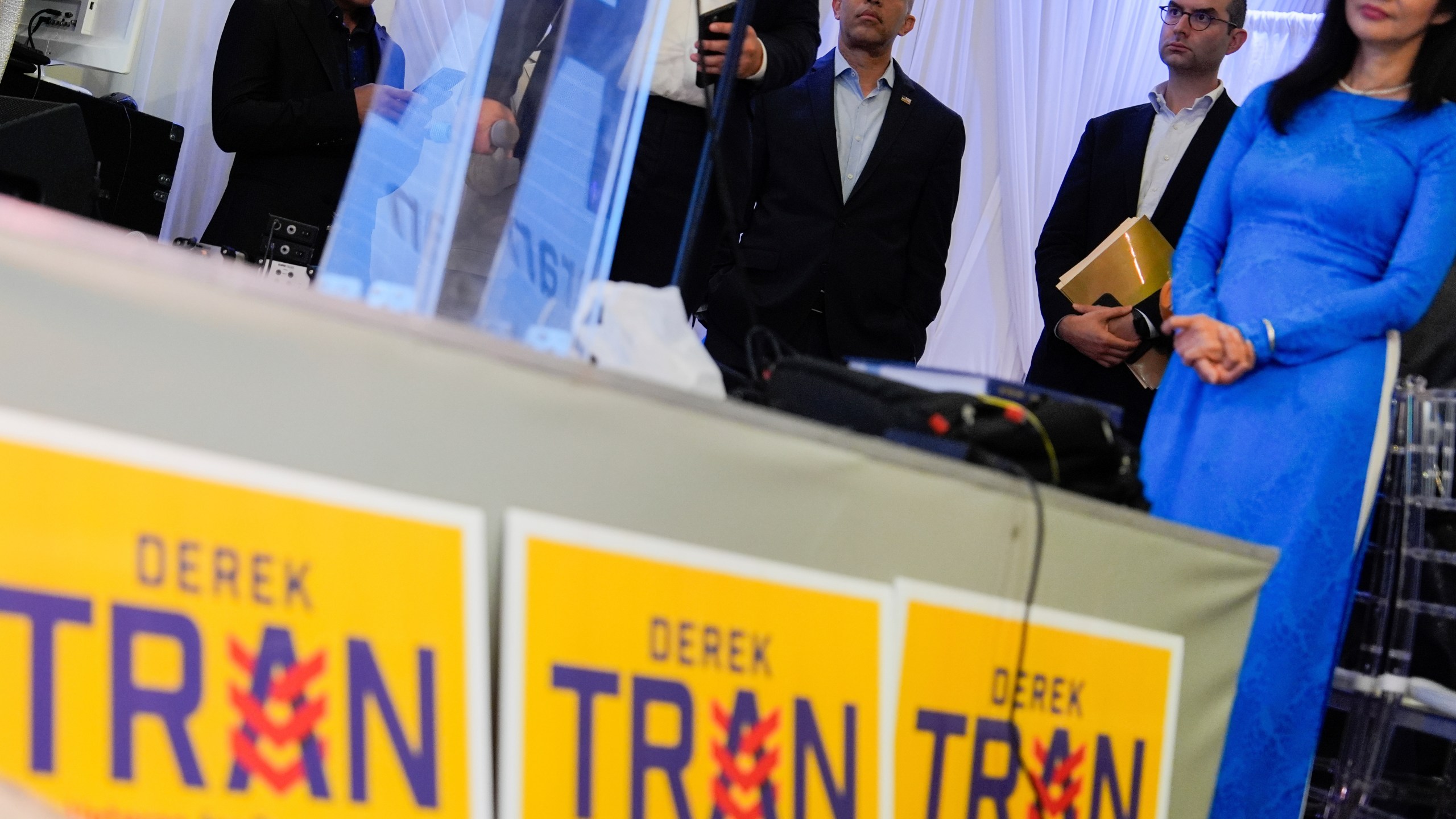 House Minority Leader Hakeem Jeffries, D-N.Y., center, attends a campaign event for Derek Tran at Golden Sea Restaurant, Saturday, Oct. 12, 2024, in Anaheim, Calif. (AP Photo/Julia Demaree Nikhinson)