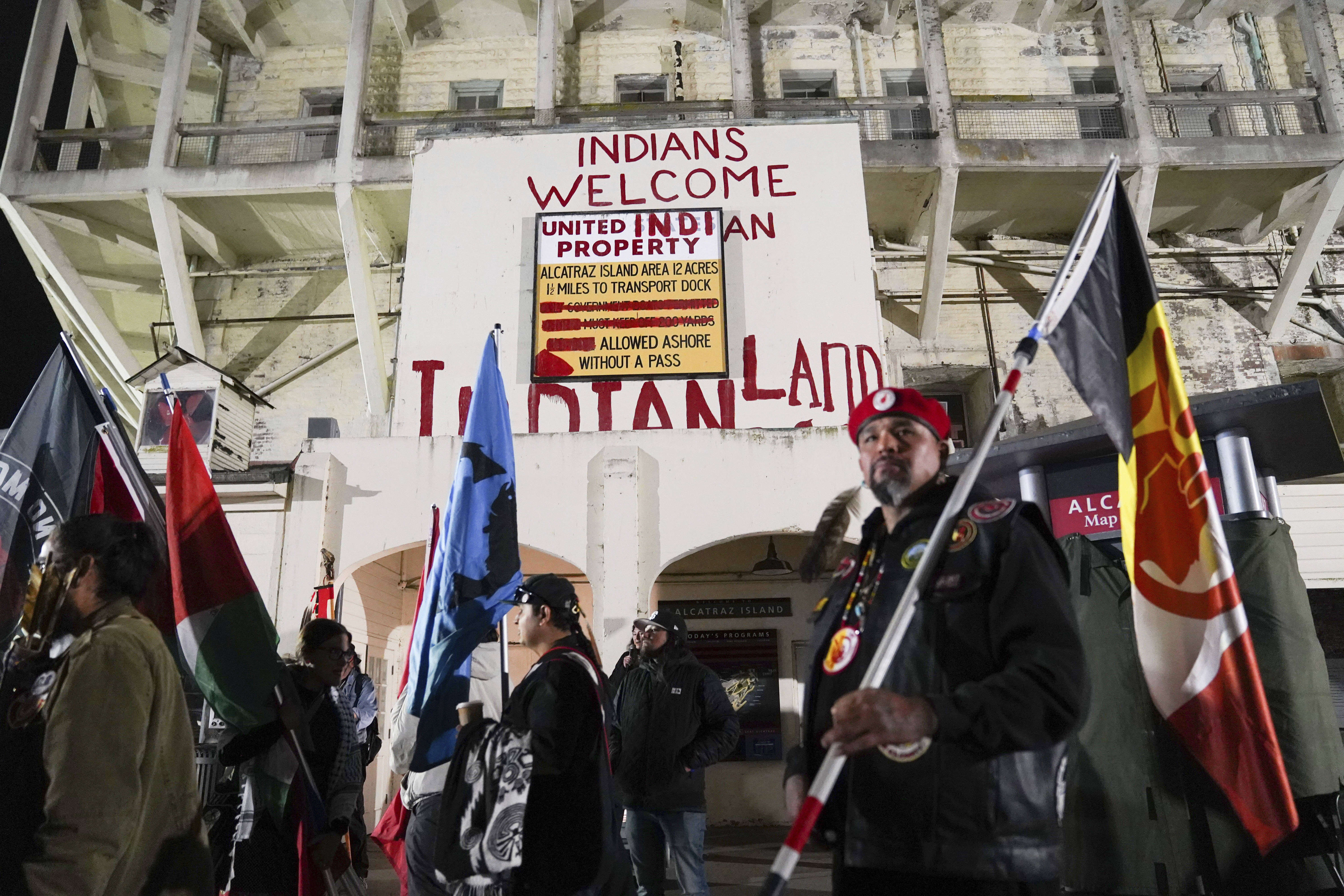 A sign from the Occupation of Alcatraz stands during Indigenous Peoples Day on Monday, Oct. 14, 2024, in San Francisco. (AP Photo/Minh Connors)