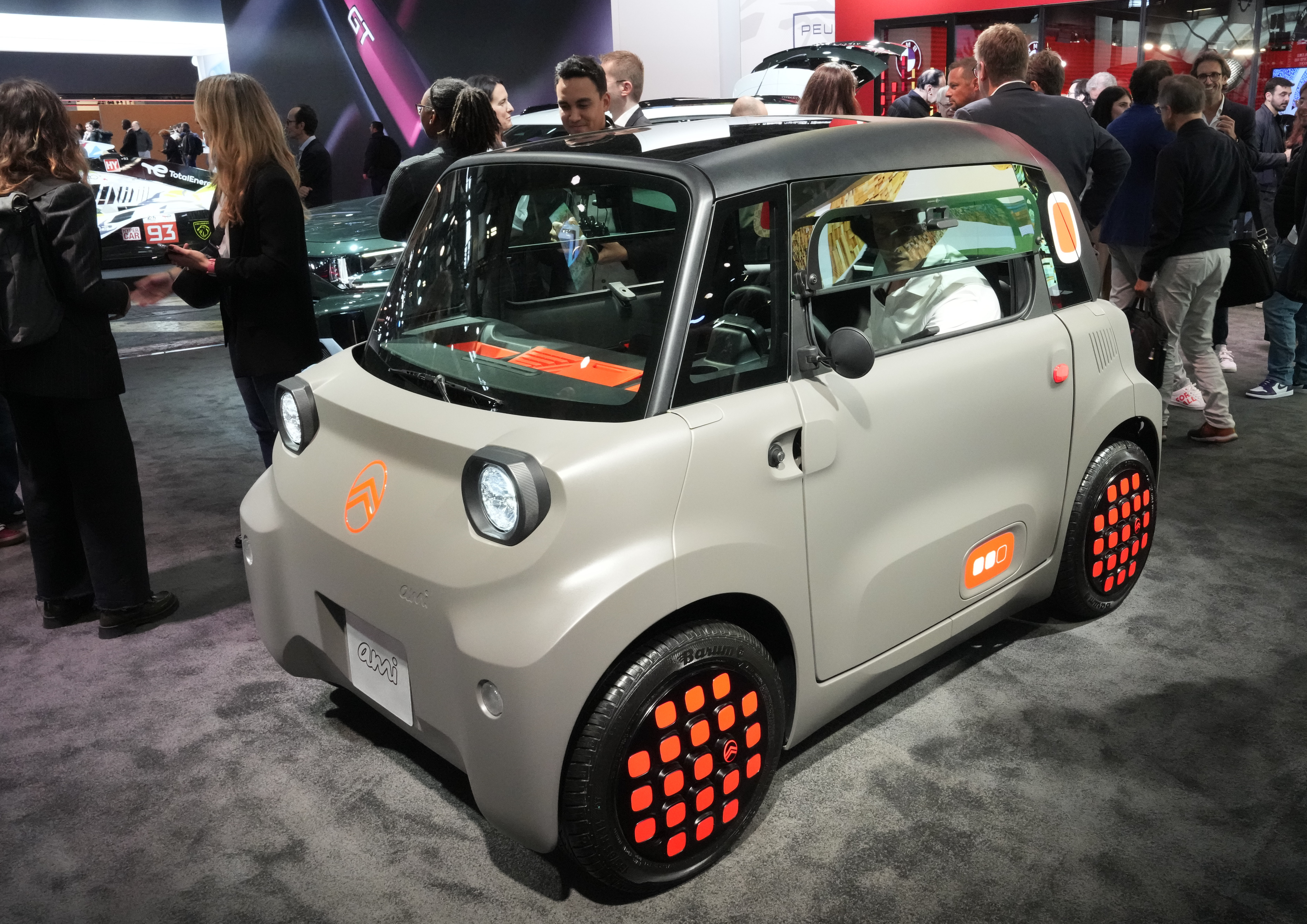 A Citroën Ami car is presented at the Paris Auto Show, in Paris, Monday, Oct. 14, 2024. (AP Photo/Michel Euler)