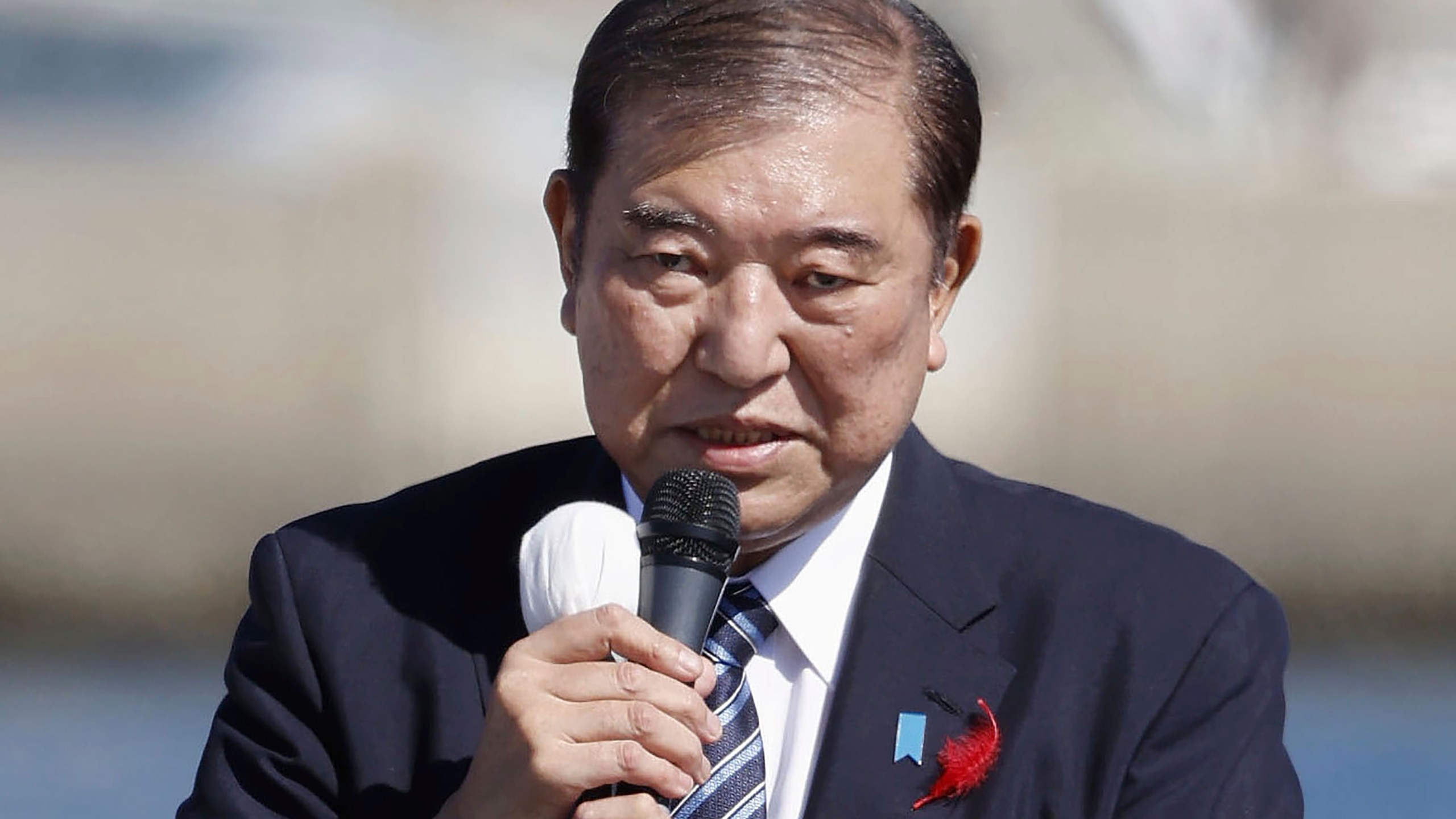 Japan's Prime Minister and head of the governing Liberal Democratic Party Shigeru Ishiba delivers a speech in Iwaki, Fukushima prefecture, Japan as official campaigning for a parliamentary election later this month officially kicked off Tuesday, Oct. 15, 2024. (Kyodo News via AP)