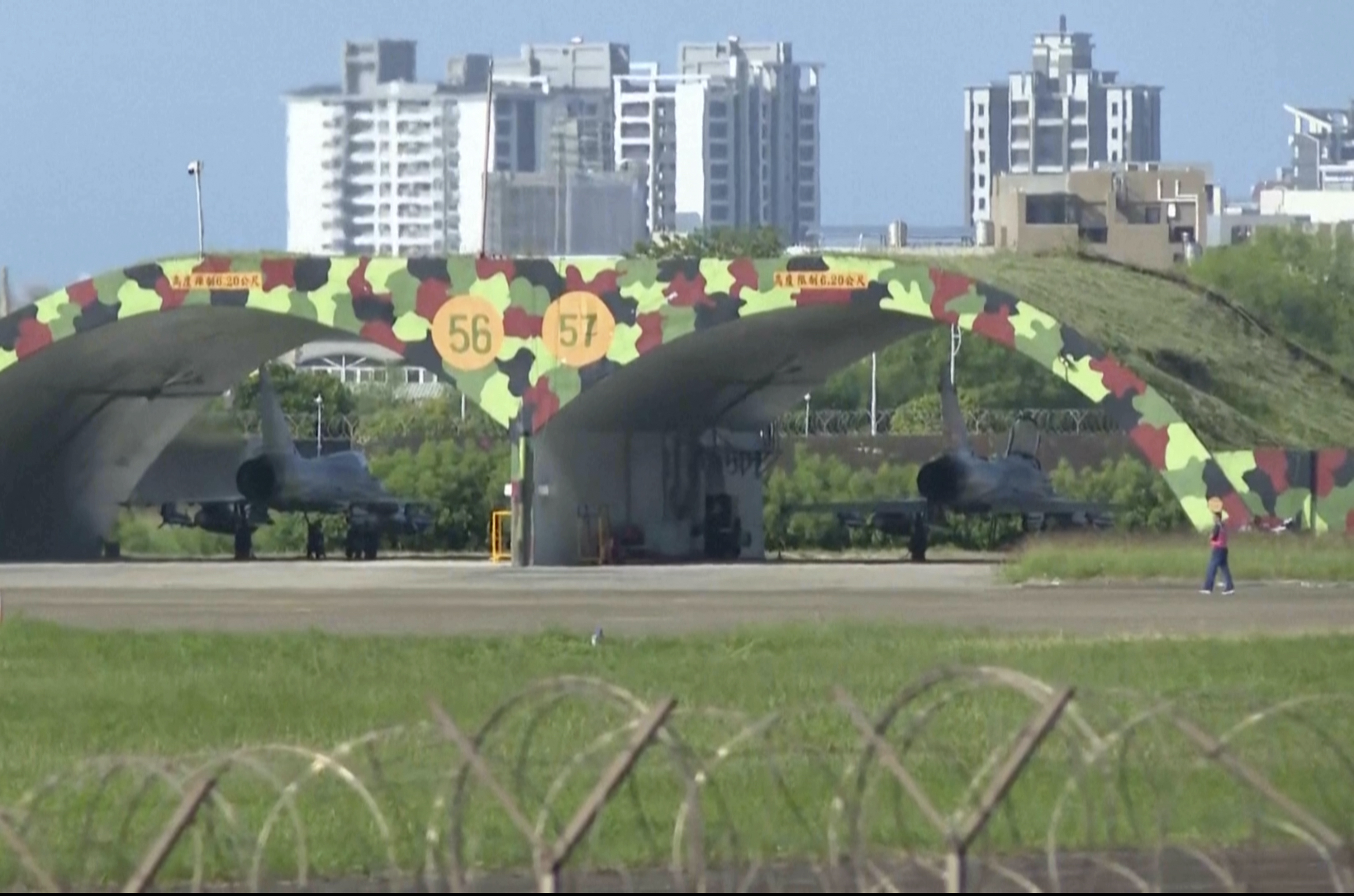 In this image taken from video, Taiwanese fighter jets prepare for take off from the Hsinchu air base in Taiwan on Monday, Nov. 14, 2024. (AP Photo/Wu Taijing)