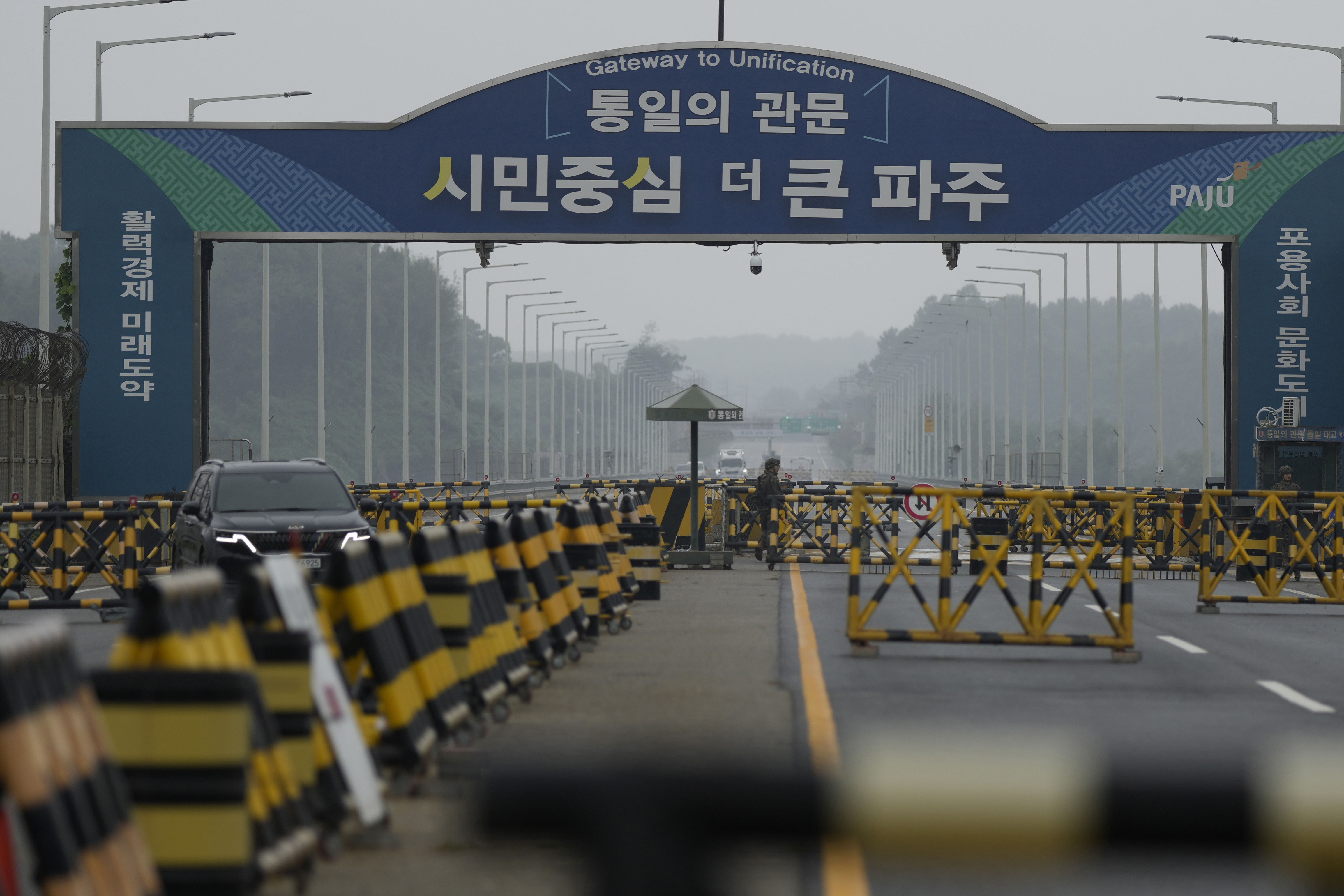 Barricades are placed near the Unification Bridge, which leads to the Panmunjom in the Demilitarized Zone in Paju, South Korea, Tuesday, Oct. 15, 2024. (AP Photo/Lee Jin-man)