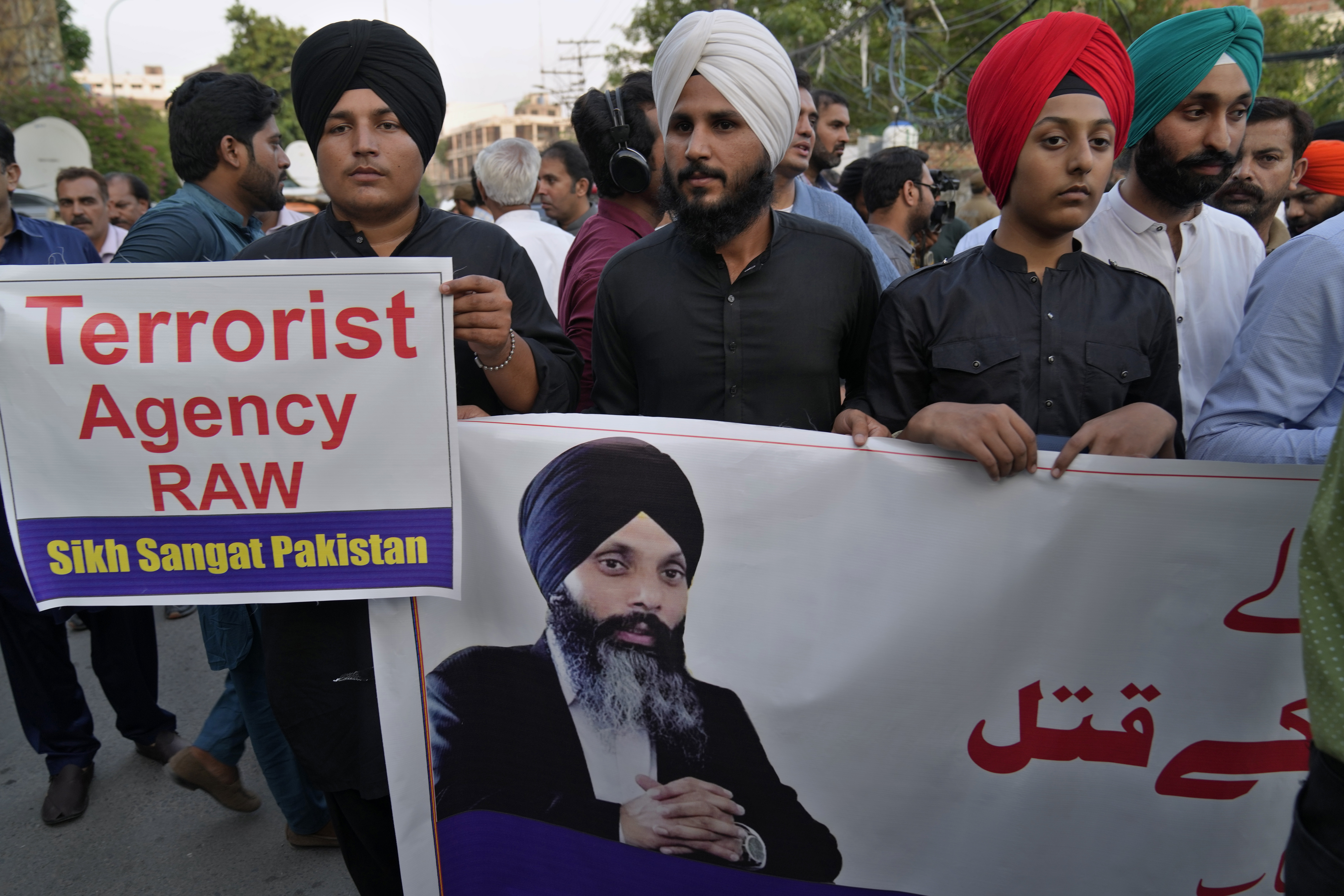 FILE -Members of Sikh community hold a protest against the killing of Hardeep Singh Nijjar, in Lahore, Pakistan, Sept. 20, 2023. (AP Photo/K.M. Chaudary, File)