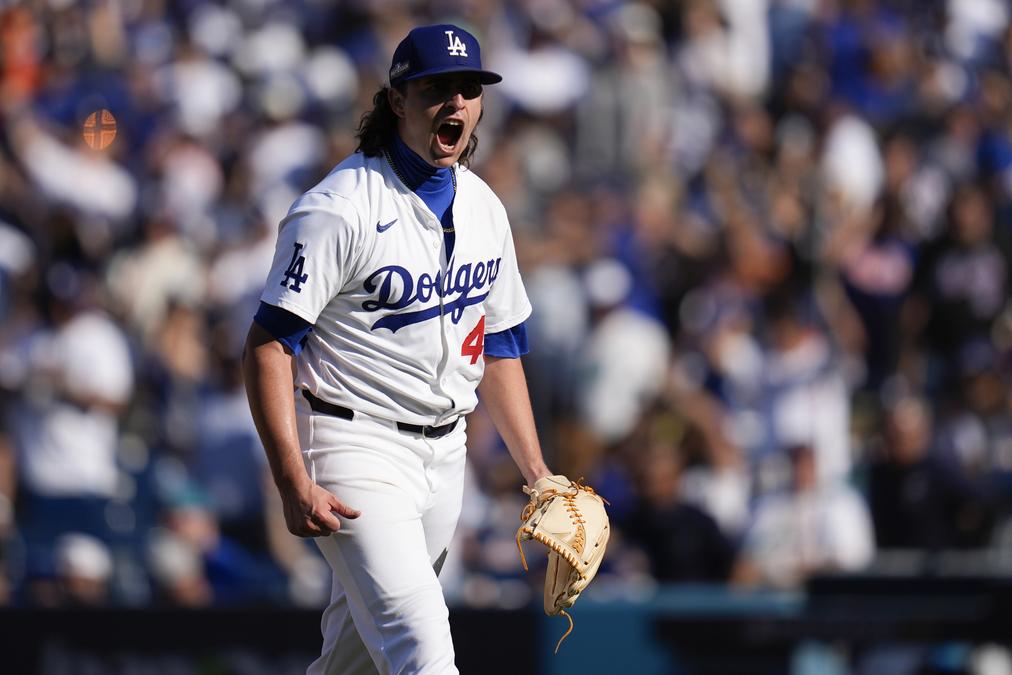 Los Angeles Dodgers pitcher Brent Honeywell celebrates after the last out in the top of the seventh inning in Game 2 of a baseball NL Championship Series against the New York Mets, Monday, Oct. 14, 2024, in Los Angeles. (AP Photo/Gregory Bull)