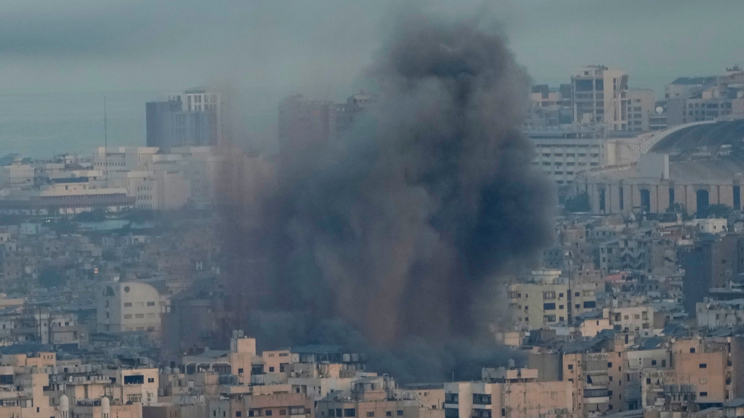 Smoke rise from Israeli airstrikes on Dahiyeh, Beirut's southern suburbs, Lebanon, Wednesday, Oct. 16, 2024. (AP Photo/Hussein Malla)