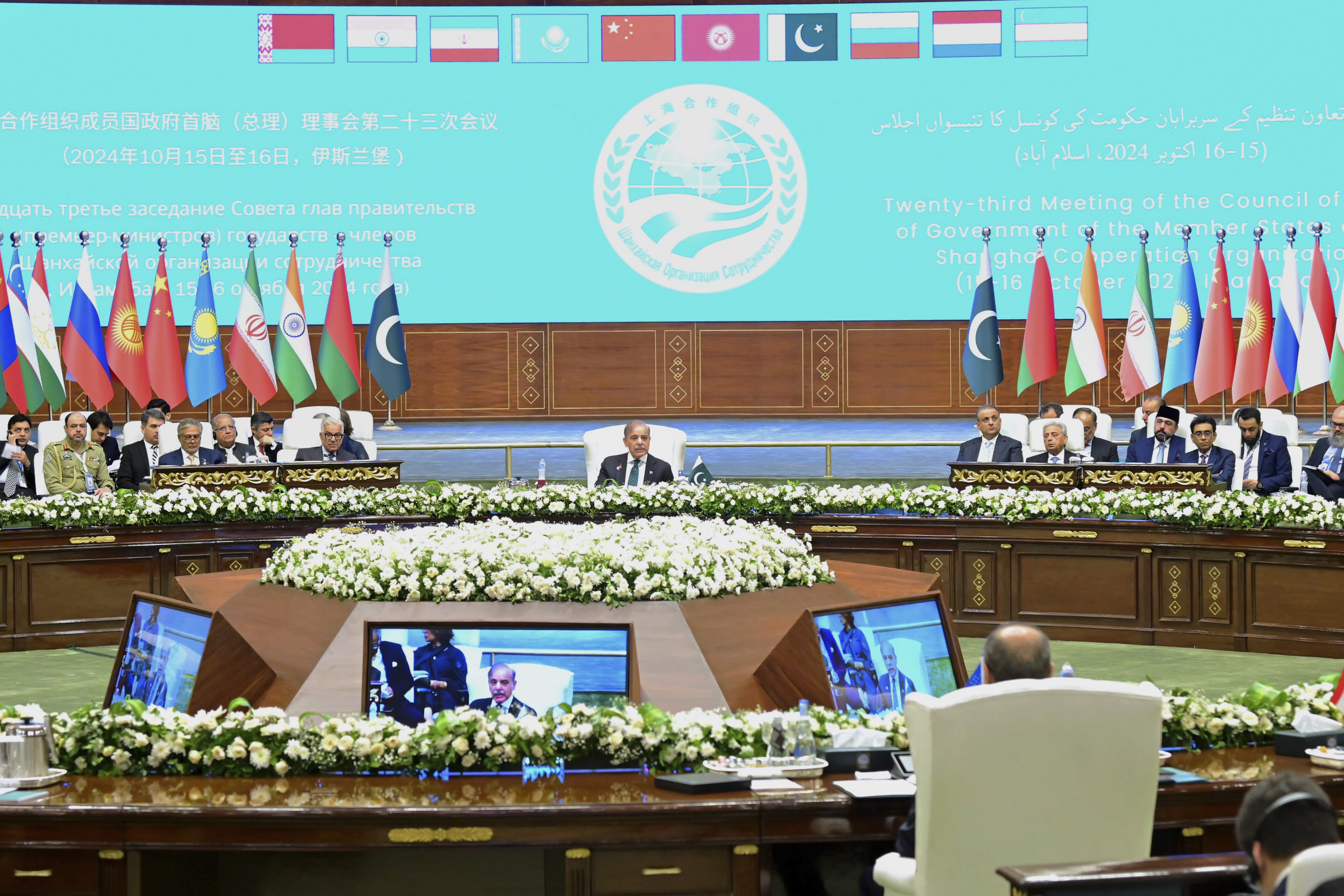 In this photo released by the Press Information Department, Pakistan's Prime Minister Shehbaz Sharif, center, delivers his speech at the opening session of Shanghai Cooperation Organization (SCO) meeting, in Islamabad, Pakistan, Wednesday, Oct. 16, 2024. (Press Information Department via AP)