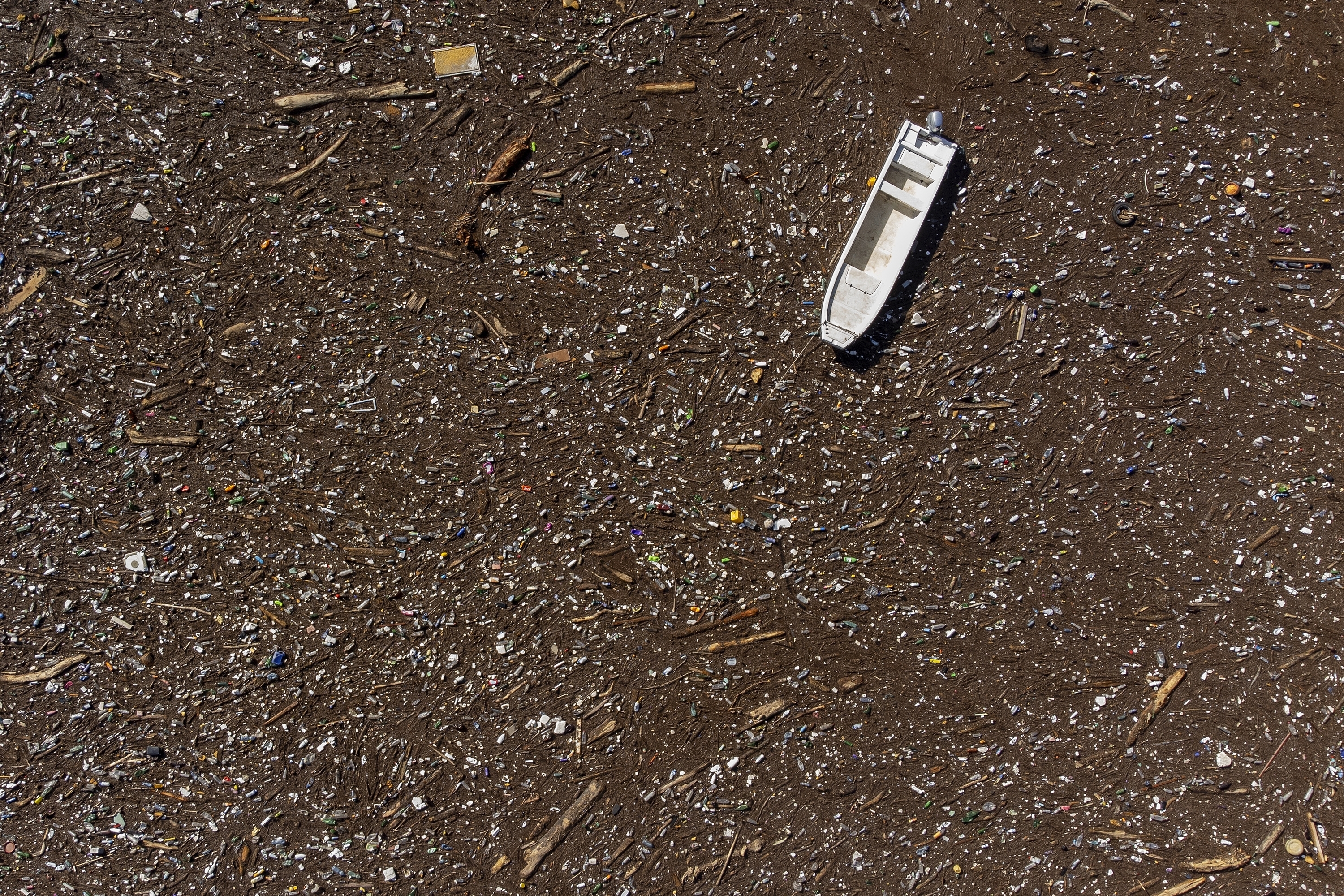 FILE - A boat is stuck near a dam on the Neretva River in Grabovica, Bosnia, Oct. 13, 2024. (AP Photo/Armin Durgut, File)