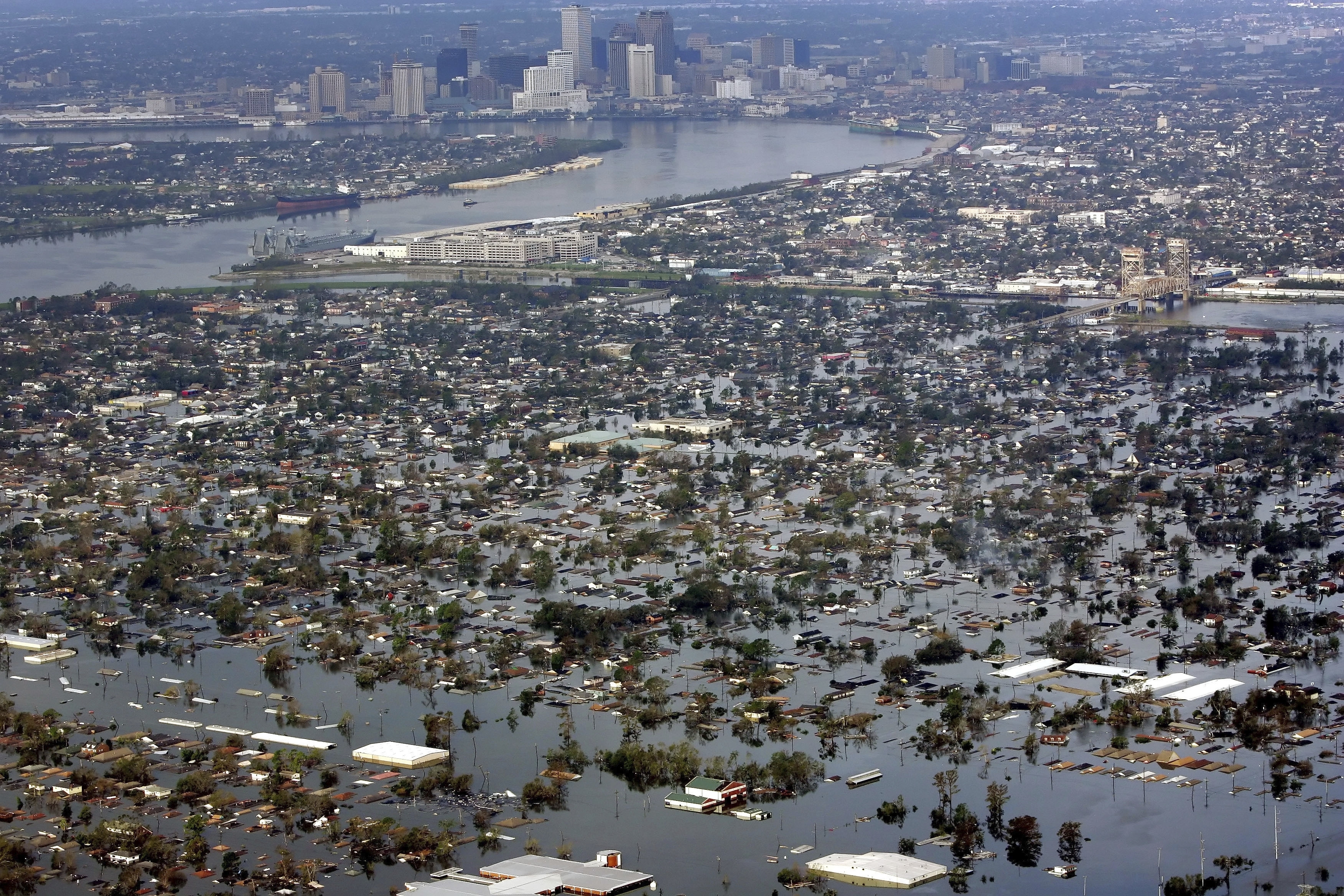 FILE - Floodwaters from Hurricane Katrina cover a portion of New Orleans on Aug. 30, 2005. (AP Photo/David J. Phillip, File)