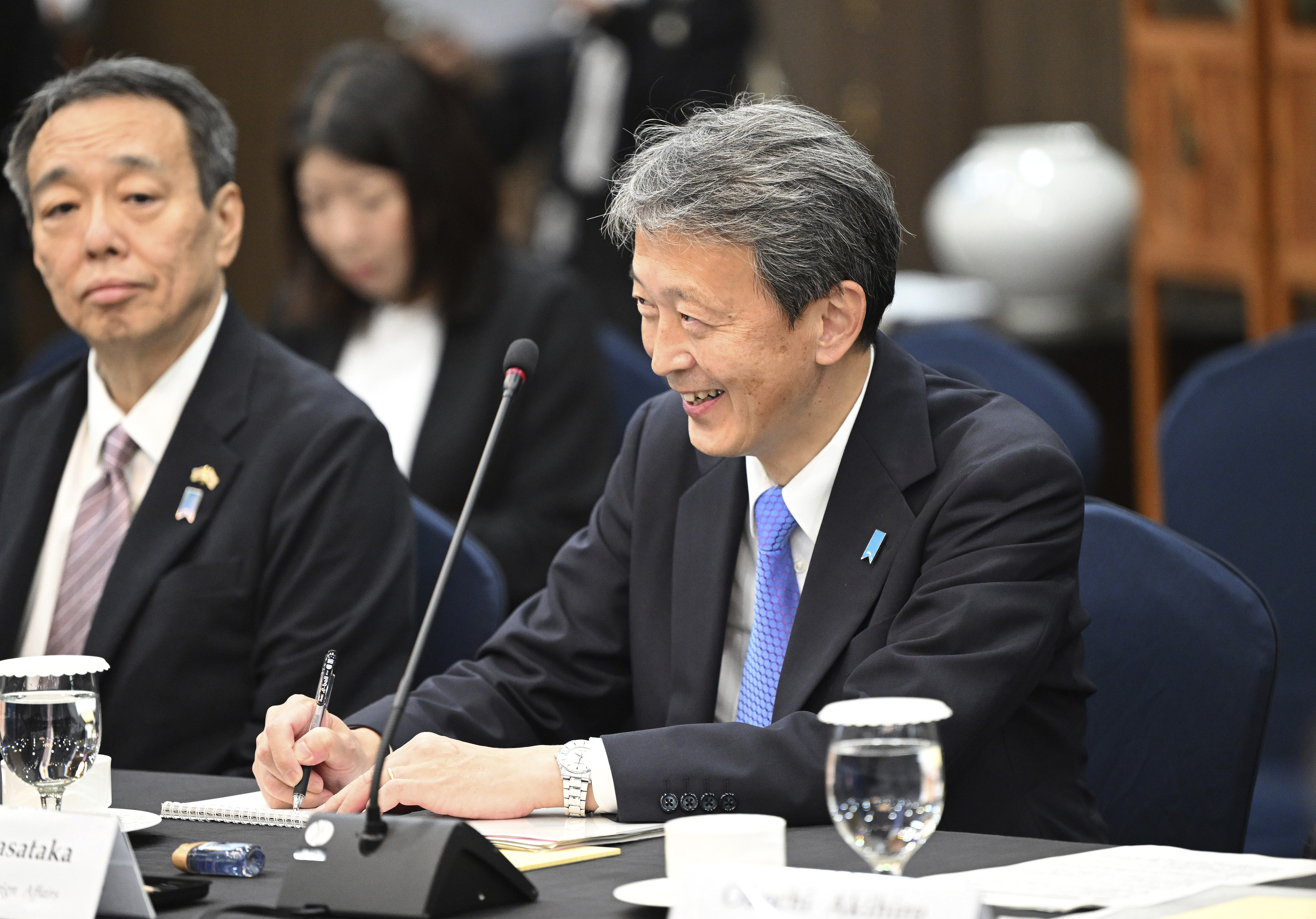 Japan's Vice Foreign Minister Masataka Okano, right, attends a trilateral meeting with South Korea's First Vice Foreign Minister Kim Hong-kyun, unseen, and United States Deputy Secretary of State Kurt Campbell, unseen, at the Foreign Ministry in Seoul Wednesday, Oct. 16, 2024. (Jung Yeon-je/Pool Photo via AP)