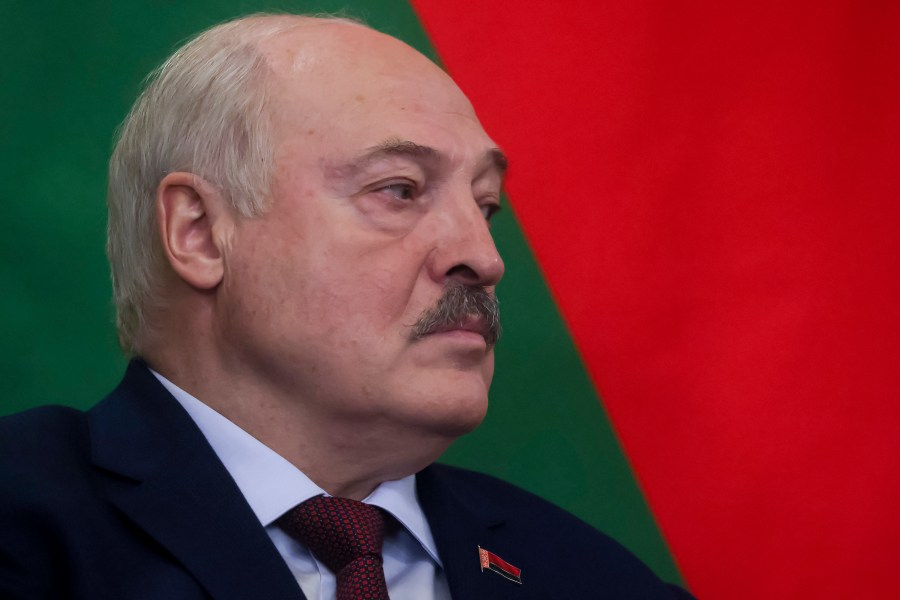 Belarusian President Alexander Lukashenko listens to Russian President Vladimir Putin during their meeting at the Kremlin in Moscow, Russia, Wednesday, Oct. 9, 2024. (Sergei Ilnitsky/Pool Photo via AP)