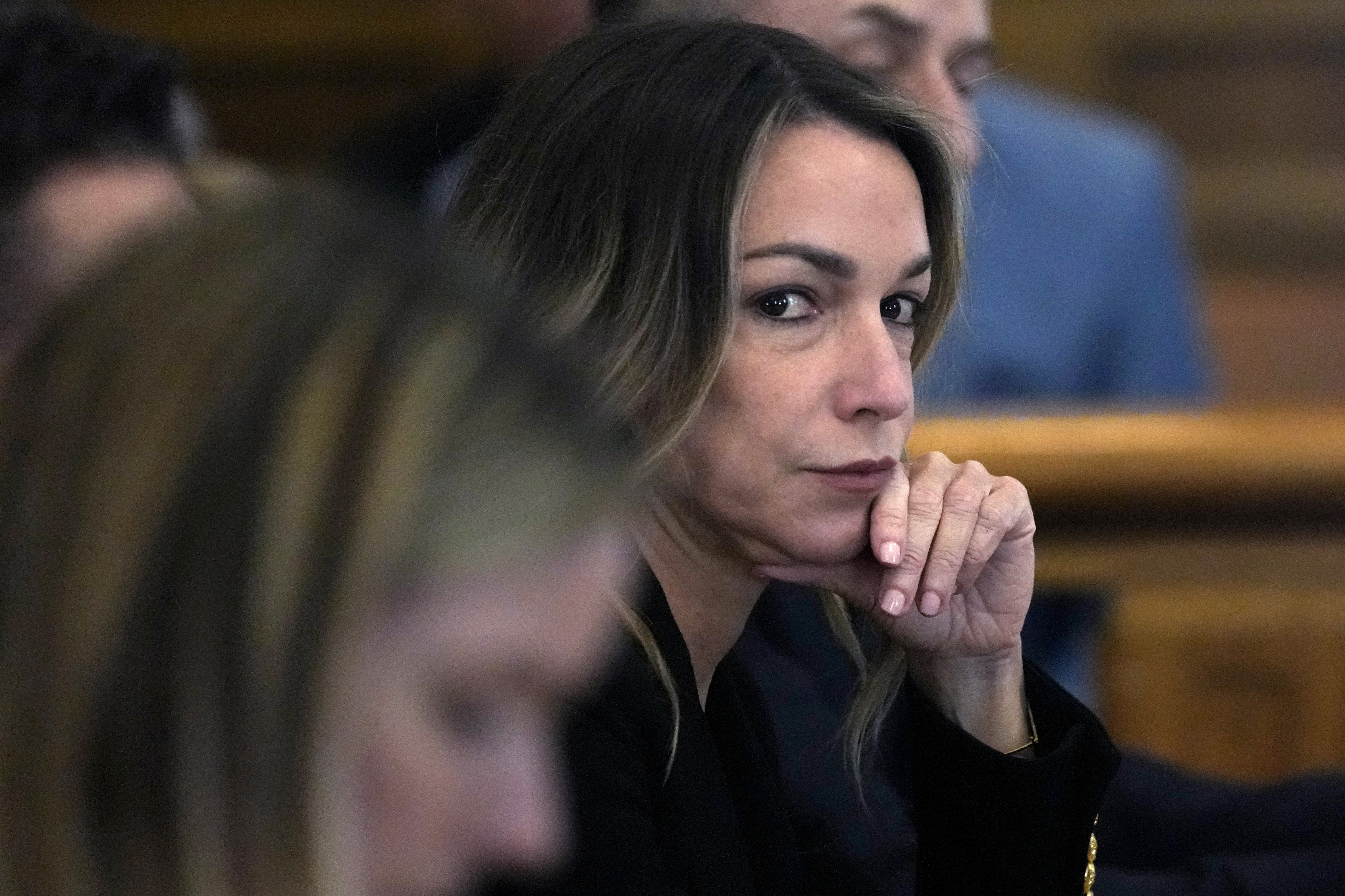 FILE — Karen Read listens to testimony during her trial at Norfolk County Superior Court, May 17, 2024, in Dedham, Mass. (AP Photo/Charles Krupa, Pool, File)