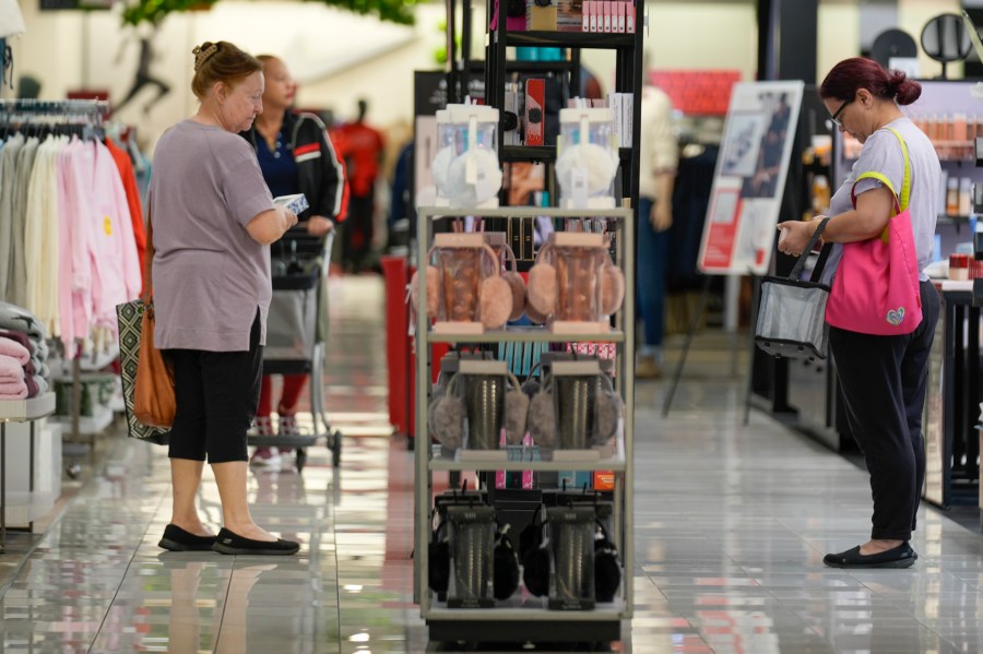 Shoppers peruse merchandise at a Kohl's in Ramsey, N.J., Thursday, Oct. 10, 2024. (AP Photo/Seth Wenig)