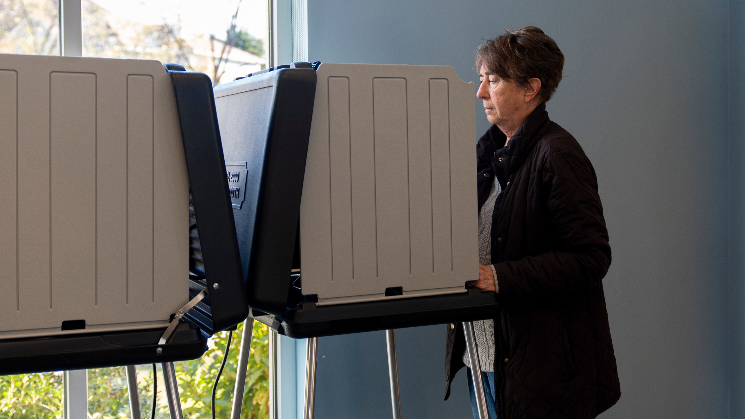 A voter marks their ballot during early in-person voting, Thursday, Oct. 17, 2024, in Asheville, N.C. (AP Photo/Stephanie Scarbrough)