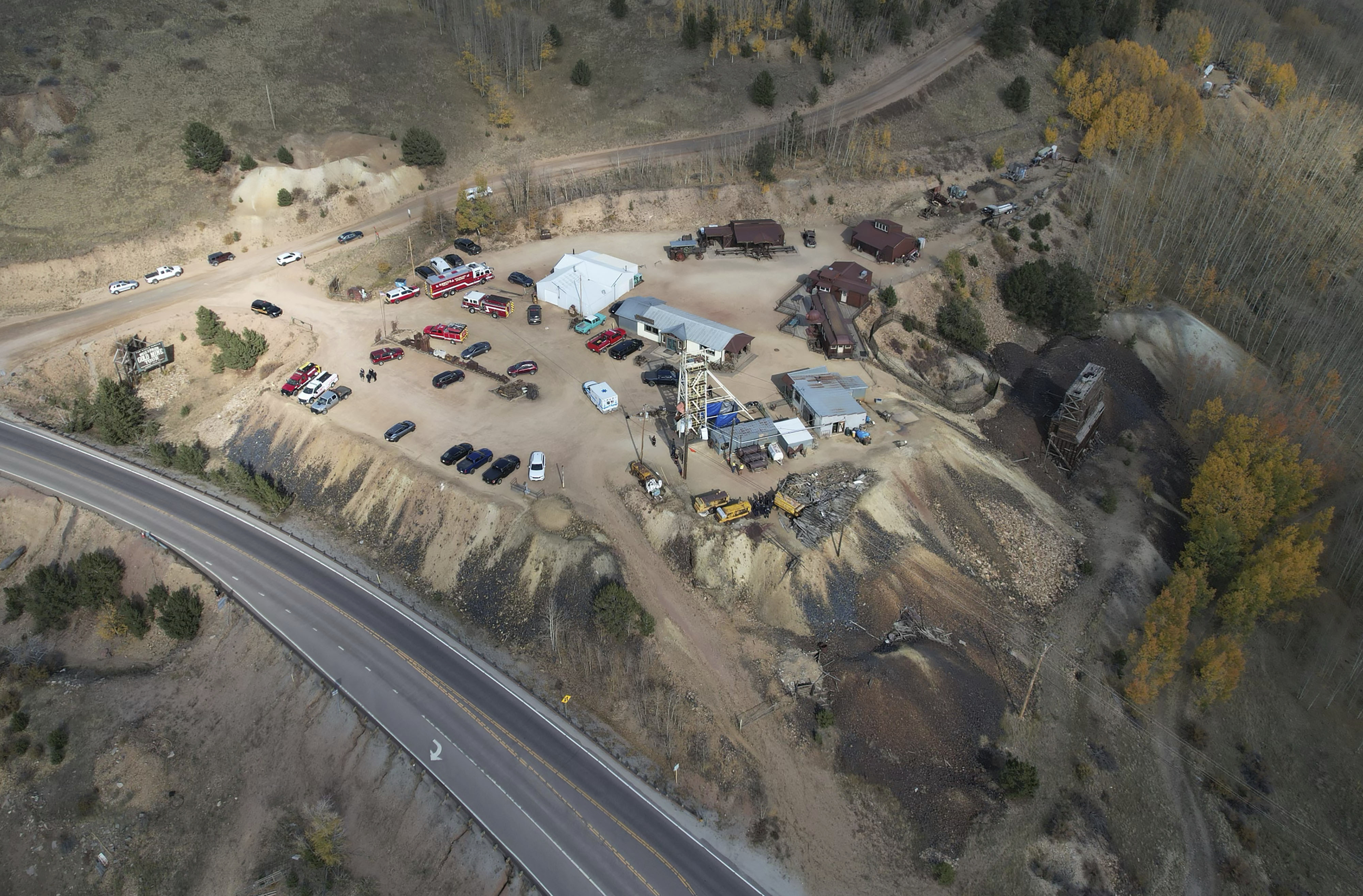 Emergency personnel stage outside the Mollie Kathleen Gold Mine in Cripple Creek, Colo., Thursday, Oct. 10, 2024, after one person died in an equipment malfunction during a tour of the mine according to the Teller County Sheriff's Department. (Arthur Trickette-Wile/The Gazette via AP)