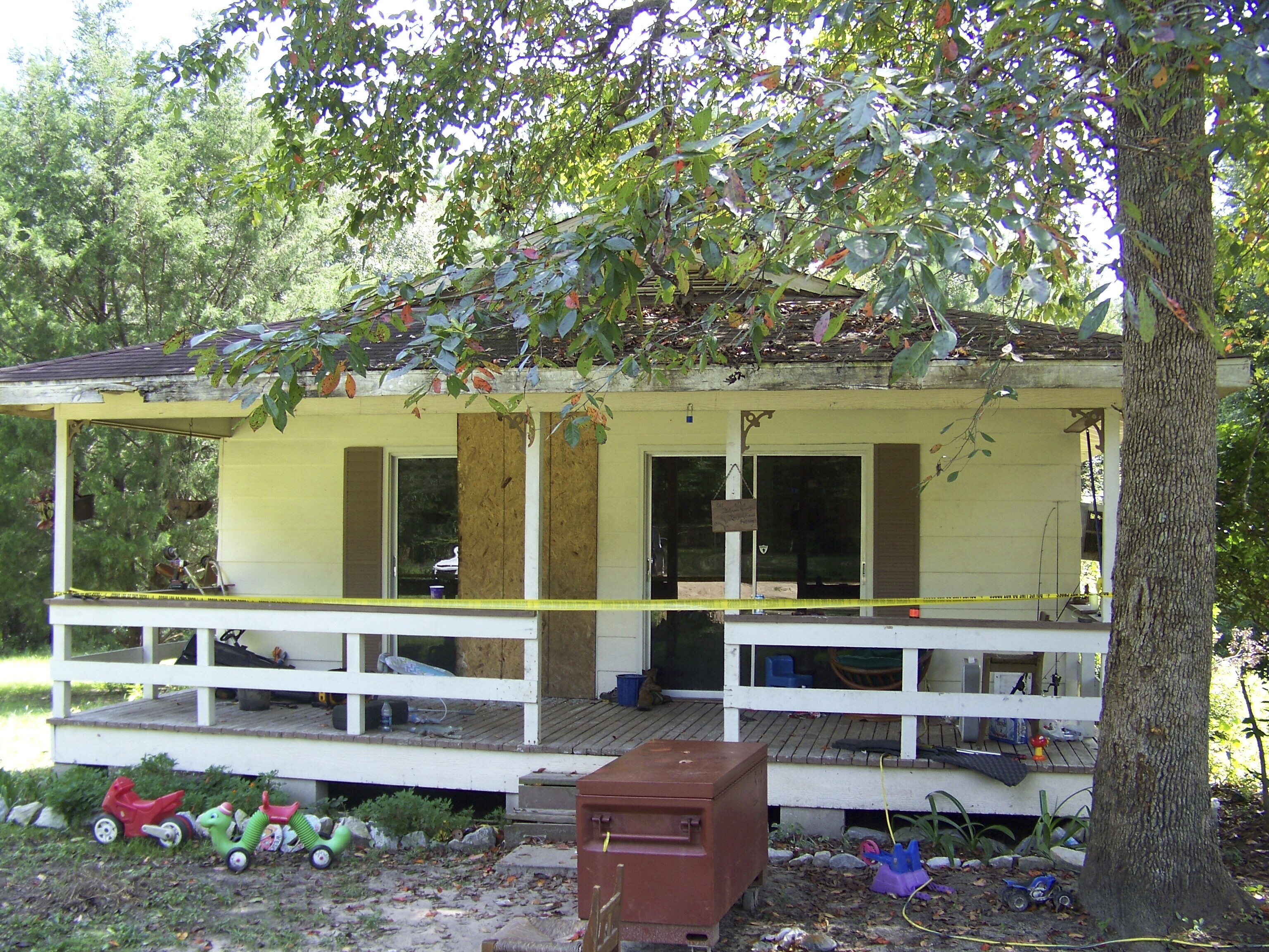 FILE - Crime scene tape marks the home on Jim Platt Road near Citronelle, Ala., Sunday, Aug. 21, 2016, where authorities said five people were killed. (John Sharp/Press-Register via AP, File)