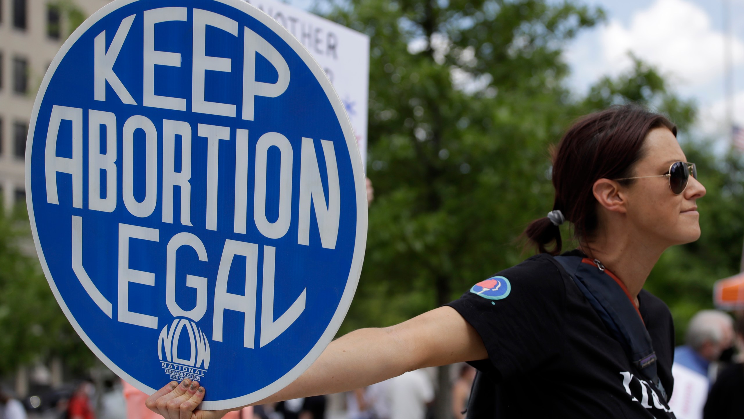 FILE - An. Abortion rights demonstrator holds a sign during a rally on May 14, 2022, in Chattanooga, Tenn. (AP Photo/Ben Margot, File)