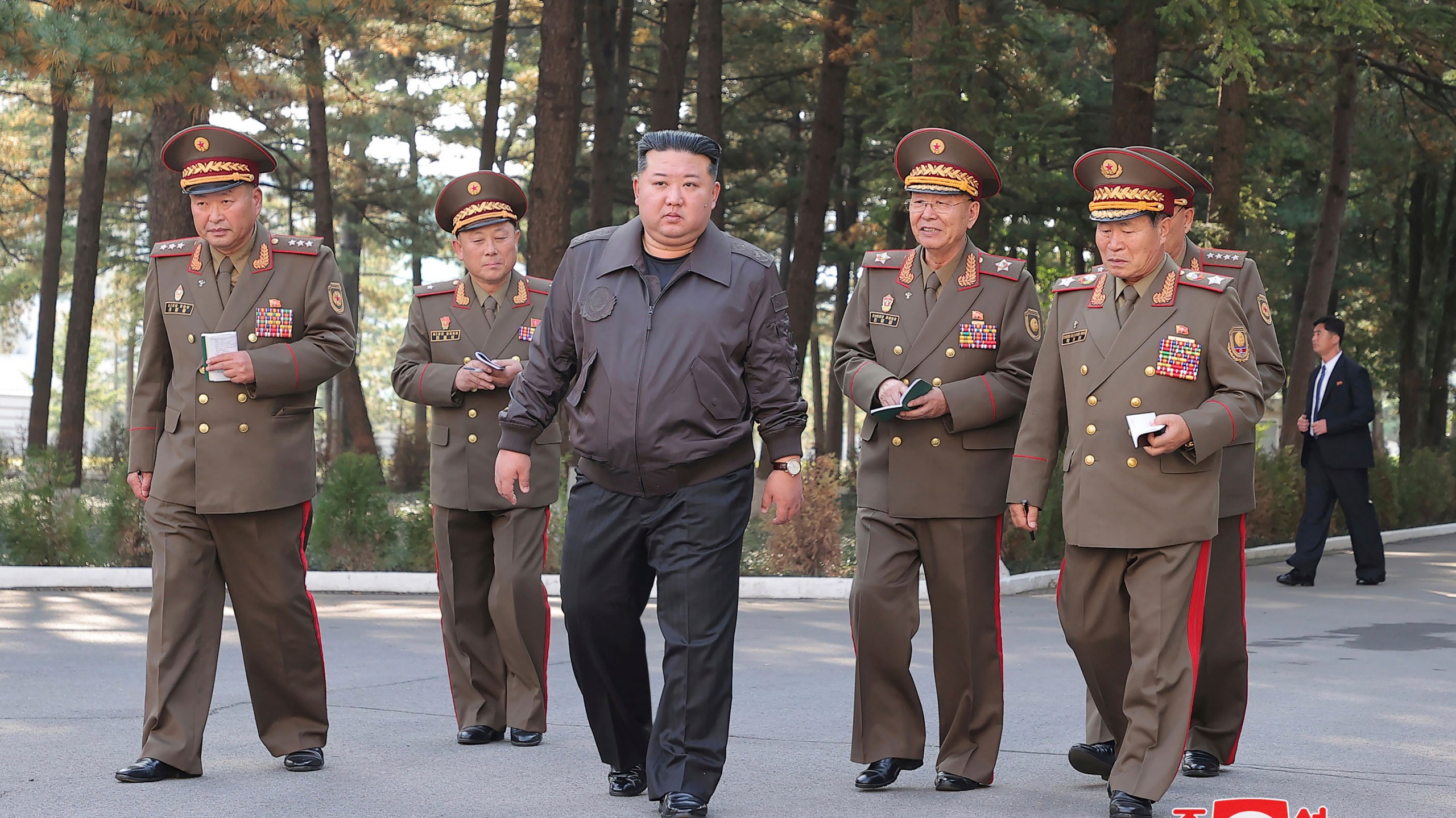 In this photo provided by the North Korean government, North Korean leader Kim Jong Un, center, visits the headquarters of the North Korean People’s Army’s 2nd Corps at an undisclosed place in North Korea Thursday, Oct. 17, 2024. Independent journalists were not given access to cover the event depicted in this image distributed by the North Korean government. The content of this image is as provided and cannot be independently verified. Korean language watermark on image as provided by source reads: "KCNA" which is the abbreviation for Korean Central News Agency. (Korean Central News Agency/Korea News Service via AP)