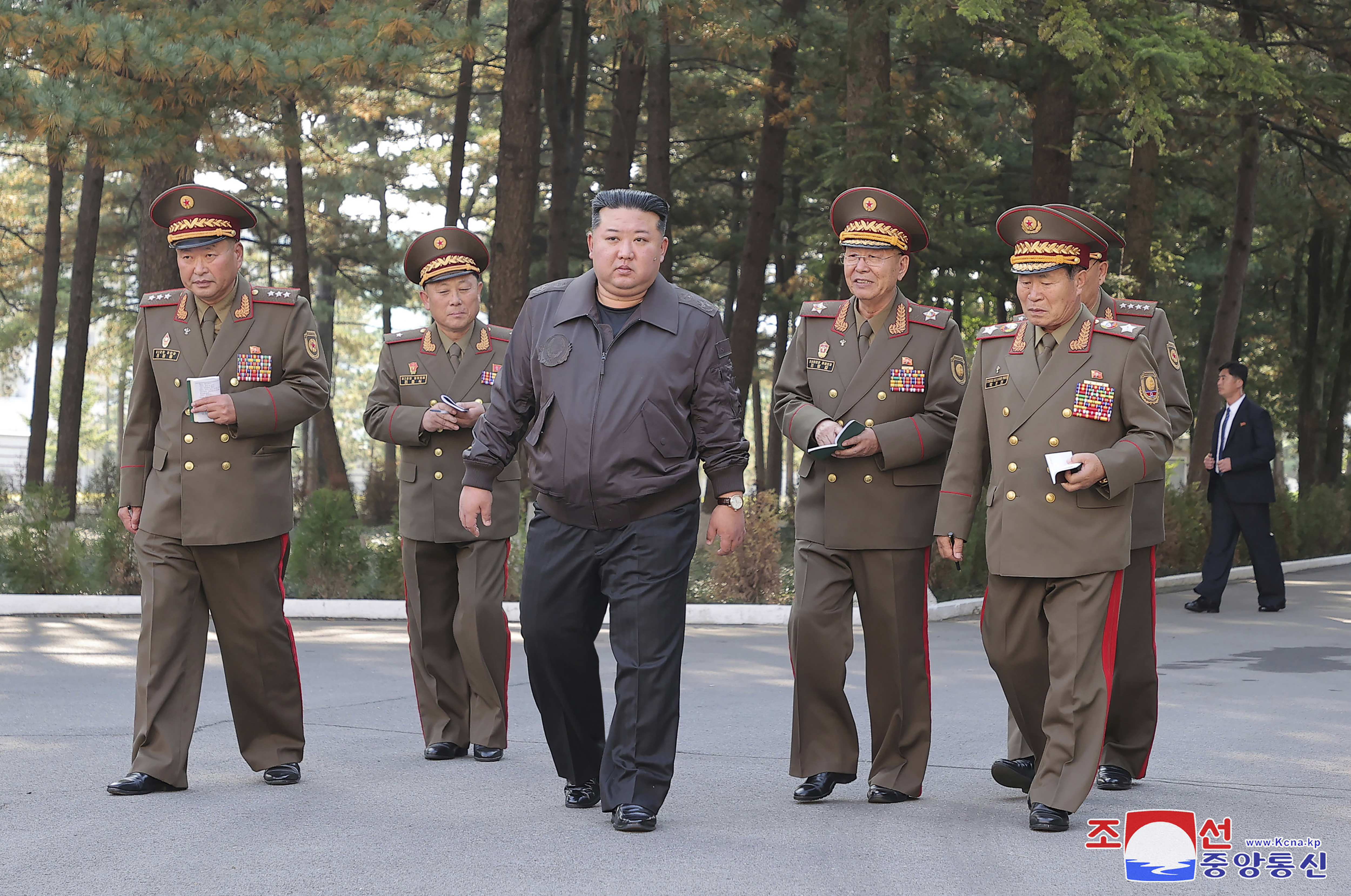 In this photo provided by the North Korean government, North Korean leader Kim Jong Un, center, visits the headquarters of the North Korean People’s Army’s 2nd Corps at an undisclosed place in North Korea Thursday, Oct. 17, 2024. Independent journalists were not given access to cover the event depicted in this image distributed by the North Korean government. The content of this image is as provided and cannot be independently verified. Korean language watermark on image as provided by source reads: "KCNA" which is the abbreviation for Korean Central News Agency. (Korean Central News Agency/Korea News Service via AP)