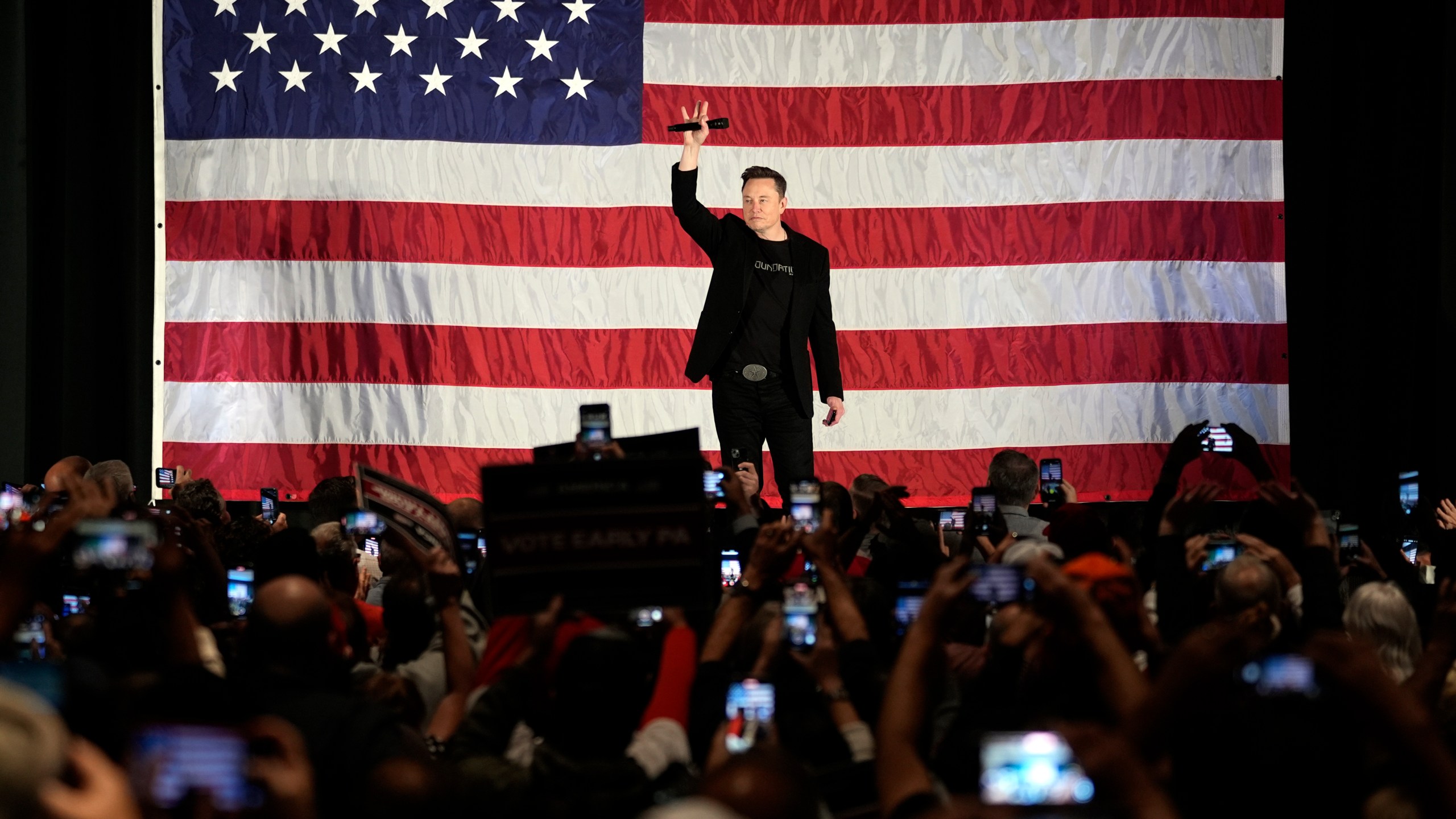 Elon Musk speaks as part of a campaign town hall in support of Republican presidential nominee former President Donald Trump in Folsom, Pa., Thursday, Oct. 17, 2024. (AP Photo/Matt Rourke)