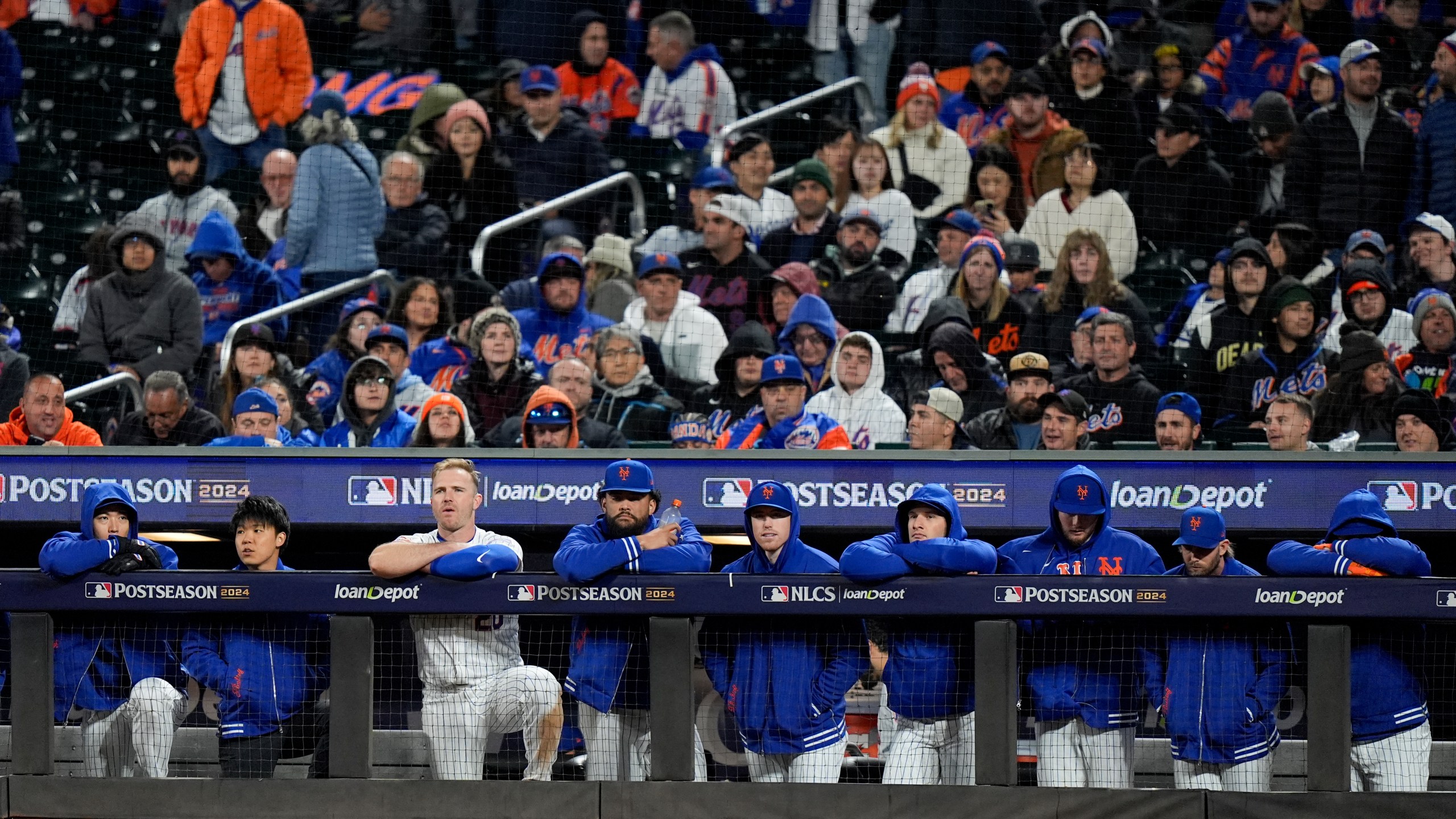 New York Mets watch during the ninth inning in Game 4 of a baseball NL Championship Series against the Los Angeles Dodgers, Thursday, Oct. 17, 2024, in New York. (AP Photo/Frank Franklin II)