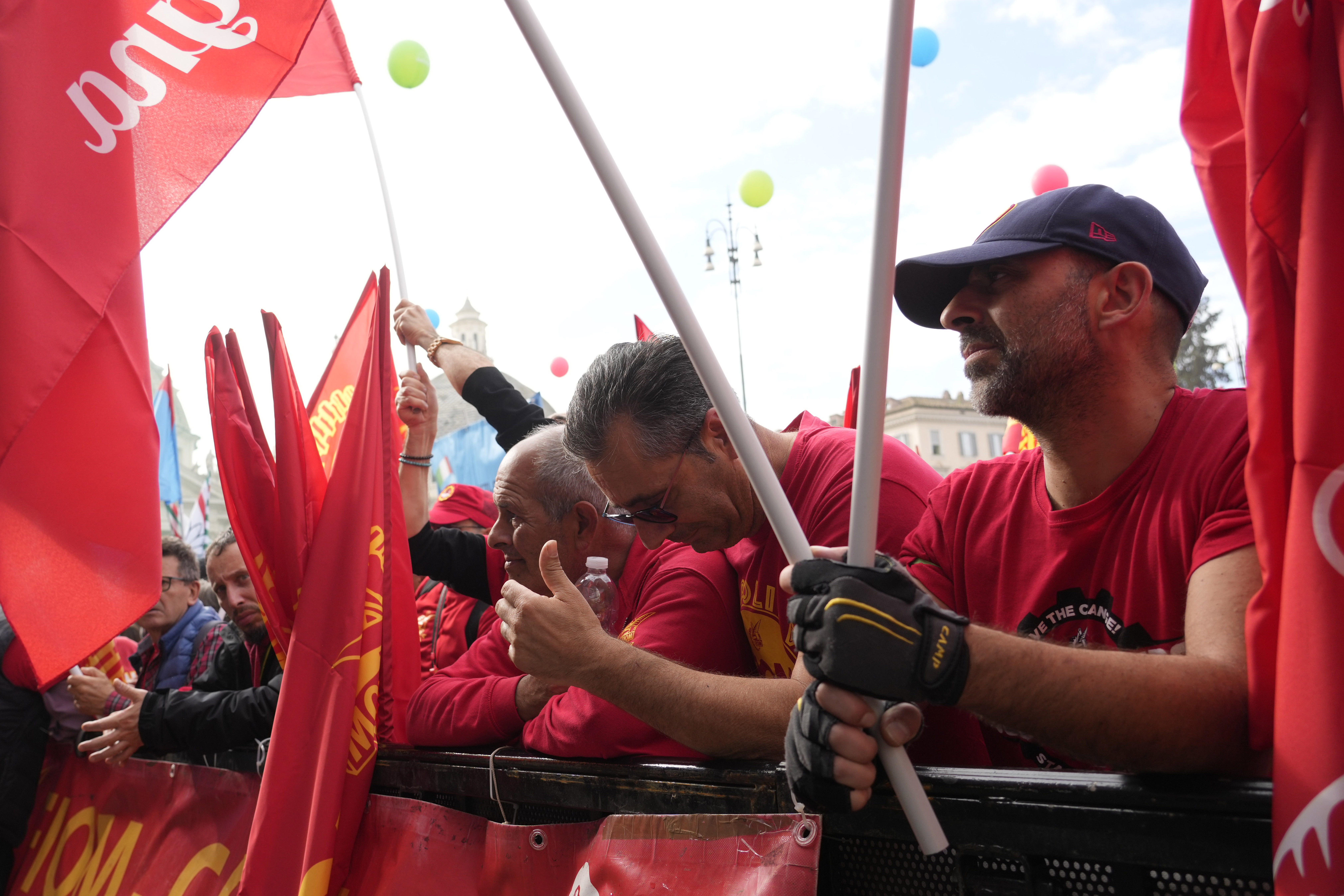 Workers of automotive sector gather in Rome's Piazza del Popolo Square during a demonstration on the occasion of their national strike, Friday, Oct. 18, 2024. (AP Photo/Gregorio Borgia)