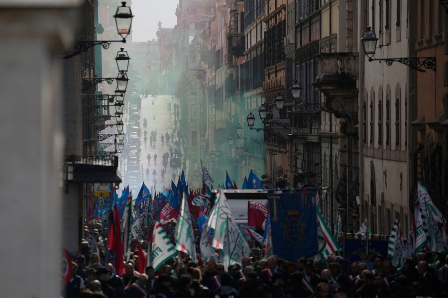 Workers of automotive sector march during a demonstration in Rome on the occasion of their national strike, Friday, Oct. 18, 2024. (AP Photo/Gregorio Borgia)