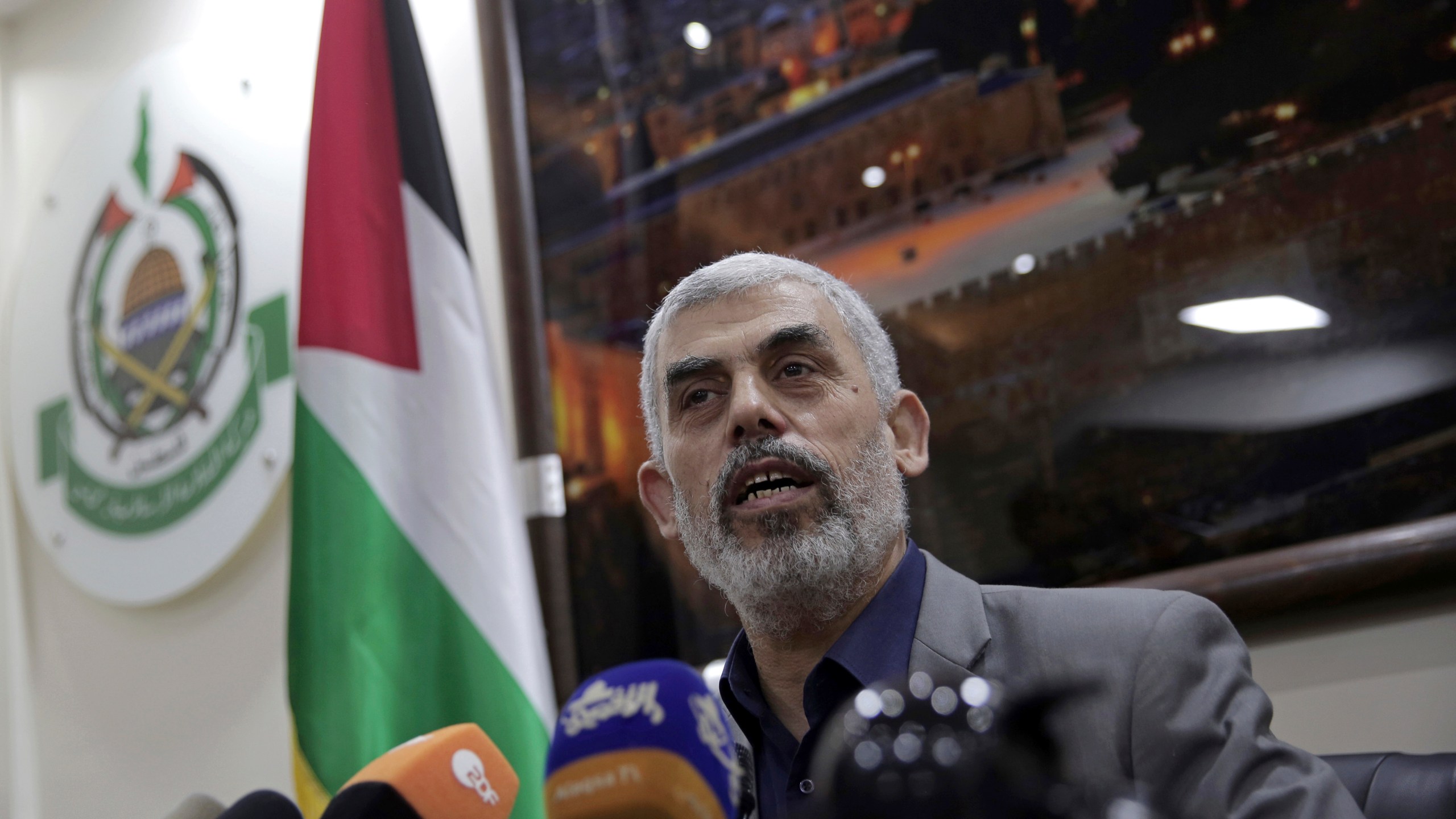 FILE - Yahya Sinwar speaks to foreign correspondents in his office in Gaza City on May 10, 2018. (AP Photo/Khalil Hamra, File)