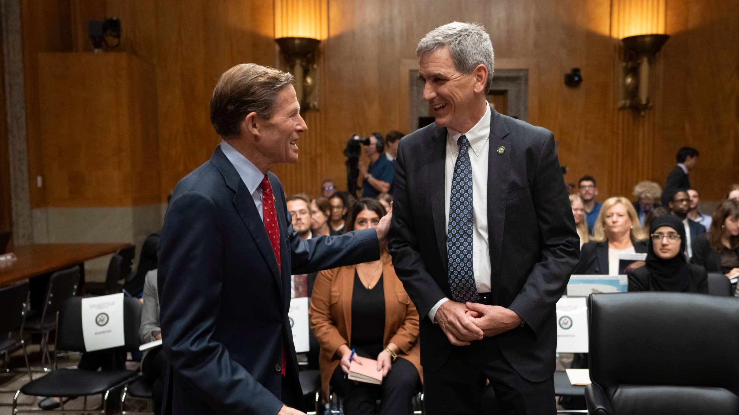 Federal Aviation Administration (FAA) Administrator Mike Whitaker, right, is greeted by Sen. Richard Blumenthal, D-Conn., left, before testifying at a Senate Committee on Homeland Security and Governmental Affairs, Subcommittee on Investigations, hearing on the FAA's oversight of Boeing, on Capitol Hill in Washington, Wednesday, Sept. 25, 2024. (AP Photo/Ben Curtis)