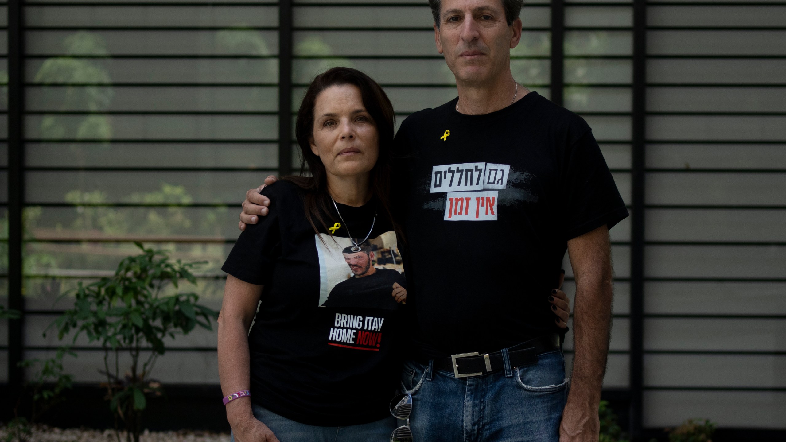 FILE - Hagit, left, and Ruby Chen, parents of fallen Israeli soldier Itay Chen, pose for a portrait in Tel Aviv, on May 8, 2024. (AP Photo/Maya Alleruzzo)