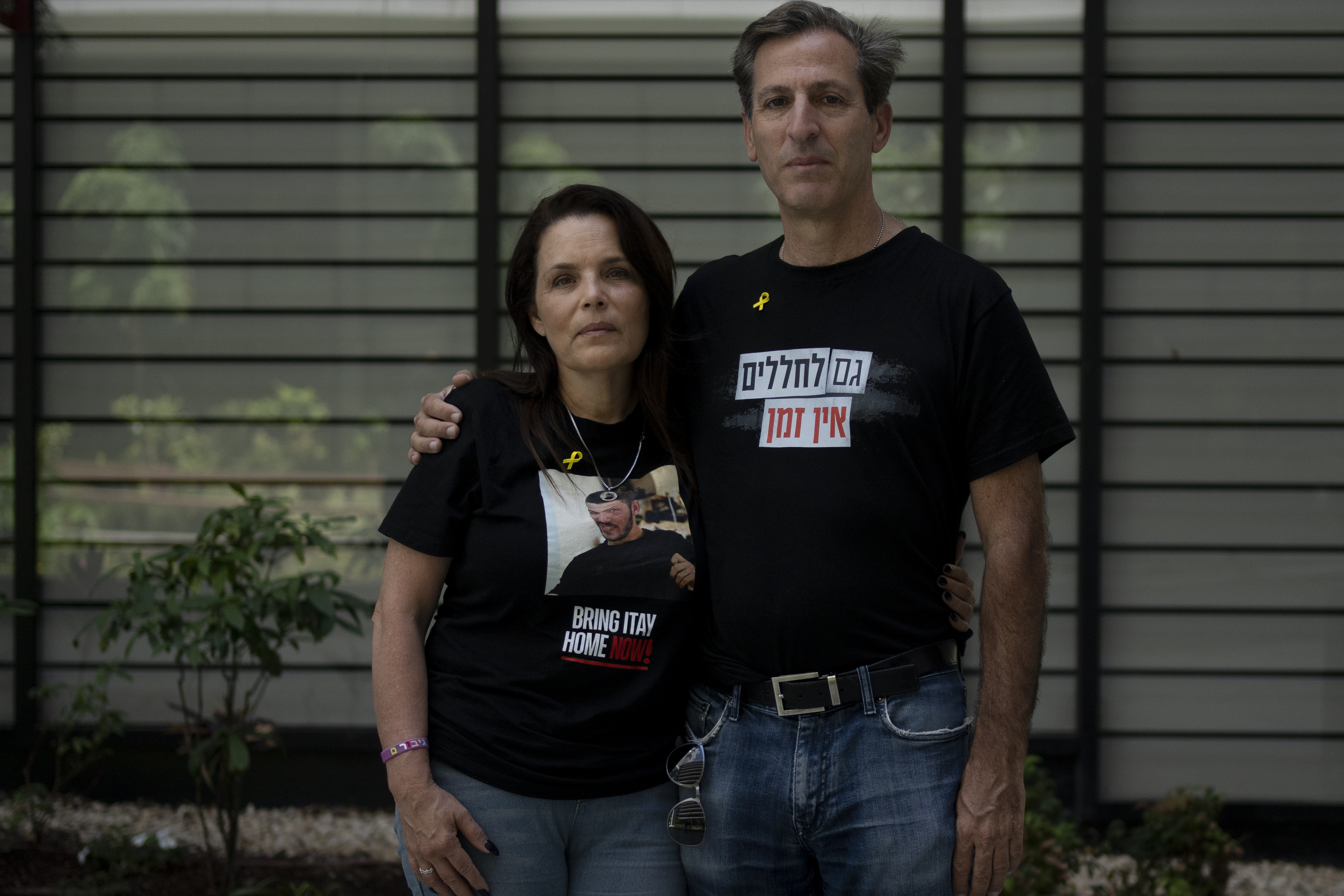 FILE - Hagit, left, and Ruby Chen, parents of fallen Israeli soldier Itay Chen, pose for a portrait in Tel Aviv, on May 8, 2024. (AP Photo/Maya Alleruzzo)