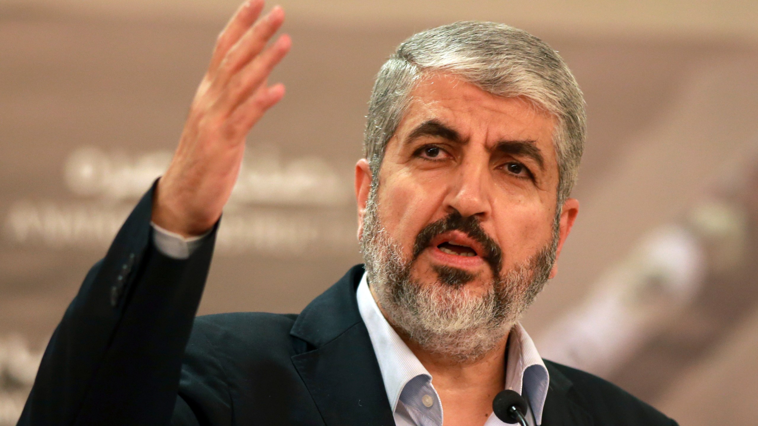 FILE - Khaled Mashaal, at the time, leader of the militant group Hamas that has governed Gaza since a 2007 takeover, speaks during a speech held in Doha, Qatar, on Aug. 28, 2014. (AP Photo/Osama Faisal, File)