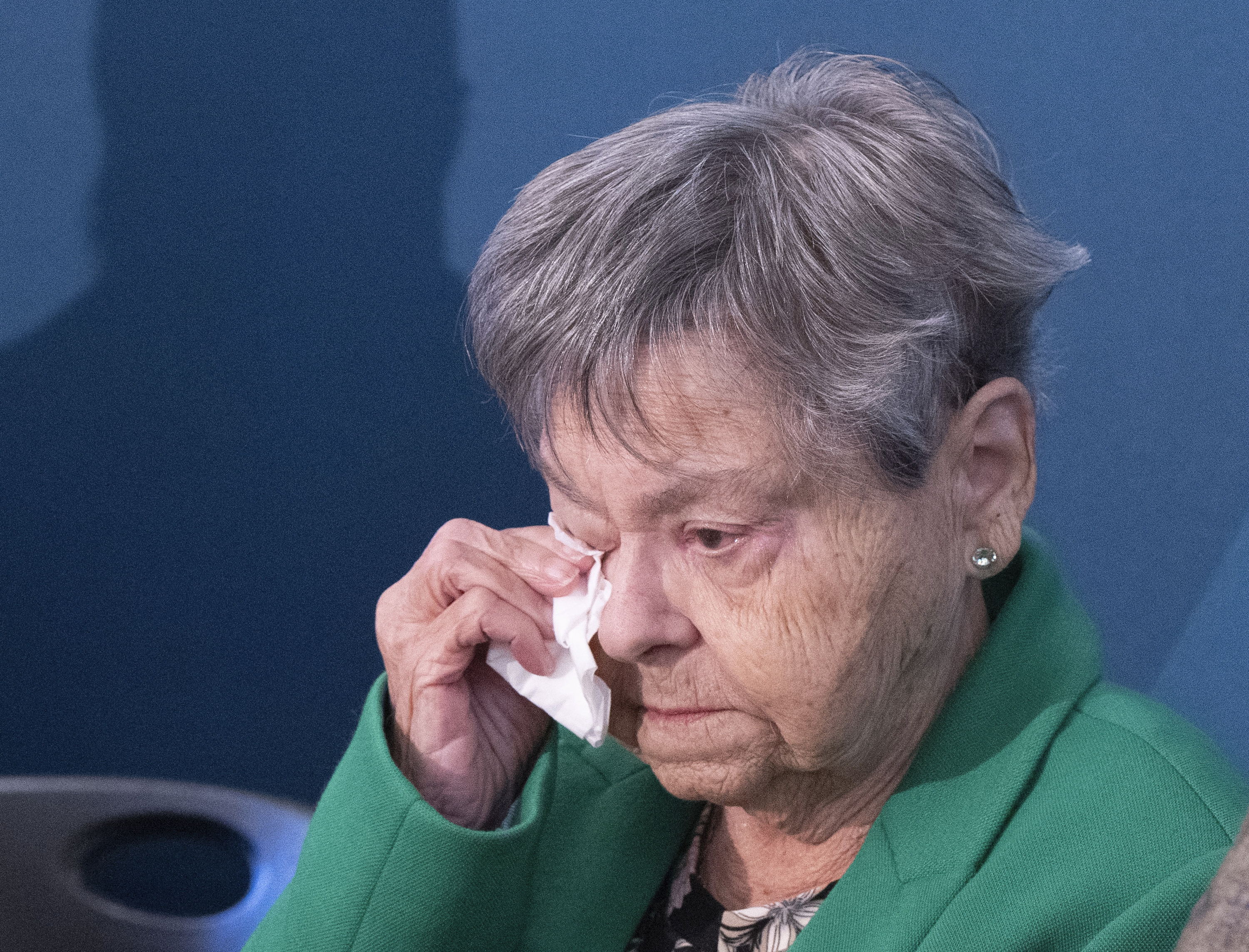 Lise Blais, widow of plaintiff Jean-Yves Blais, wipes her eye during a news conference in Montreal, on Friday, Oct. 18, 2024. Tobacco companies have offered to pay nearly $24 billion USD in compensation to smokers and their loved ones. (Ryan Remiorz/The Canadian Press via AP)