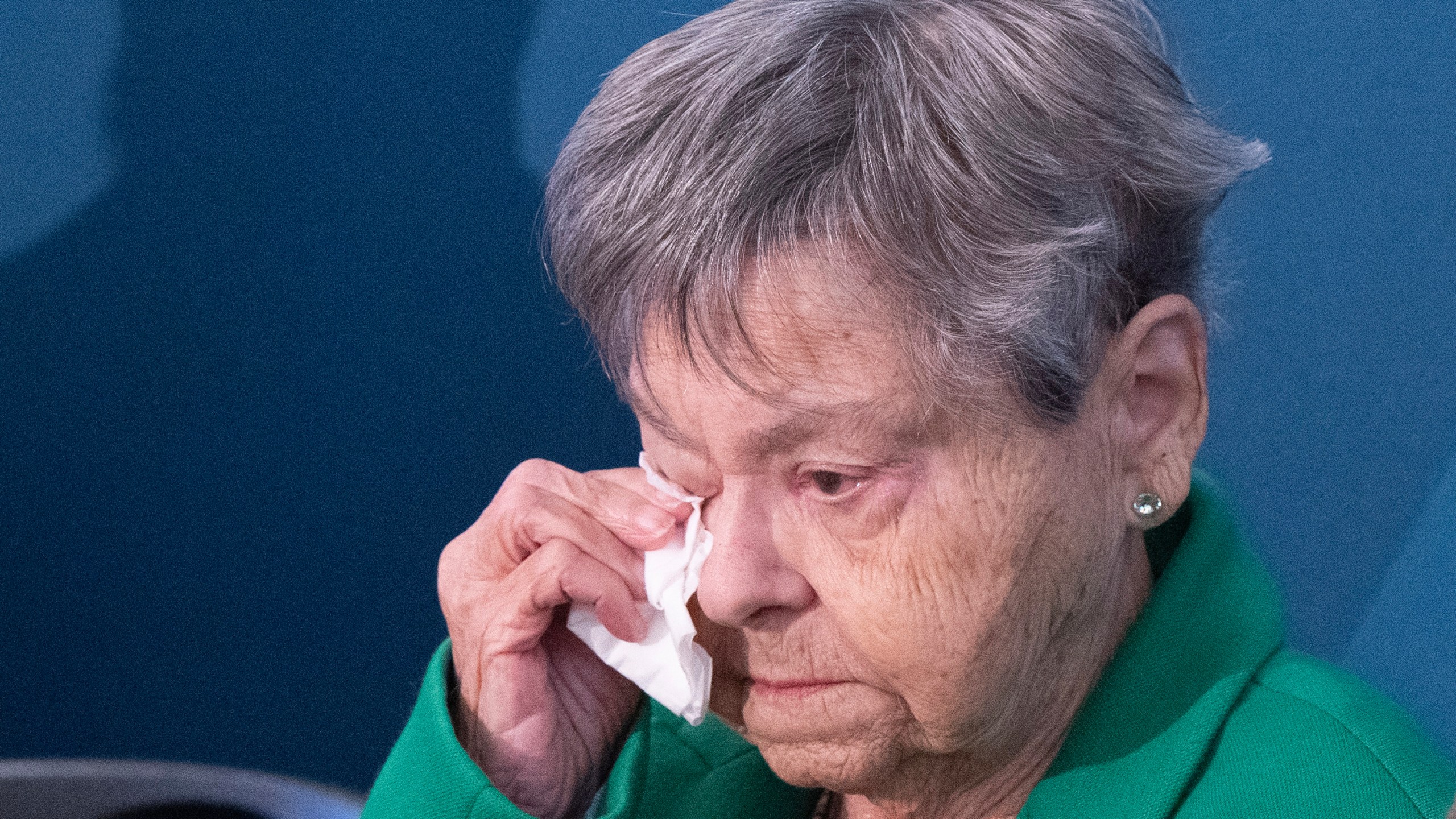 Lise Blais, widow of plaintiff Jean-Yves Blais, wipes her eye during a news conference in Montreal, on Friday, Oct. 18, 2024. Tobacco companies have offered to pay nearly $24 billion USD in compensation to smokers and their loved ones. (Ryan Remiorz/The Canadian Press via AP)