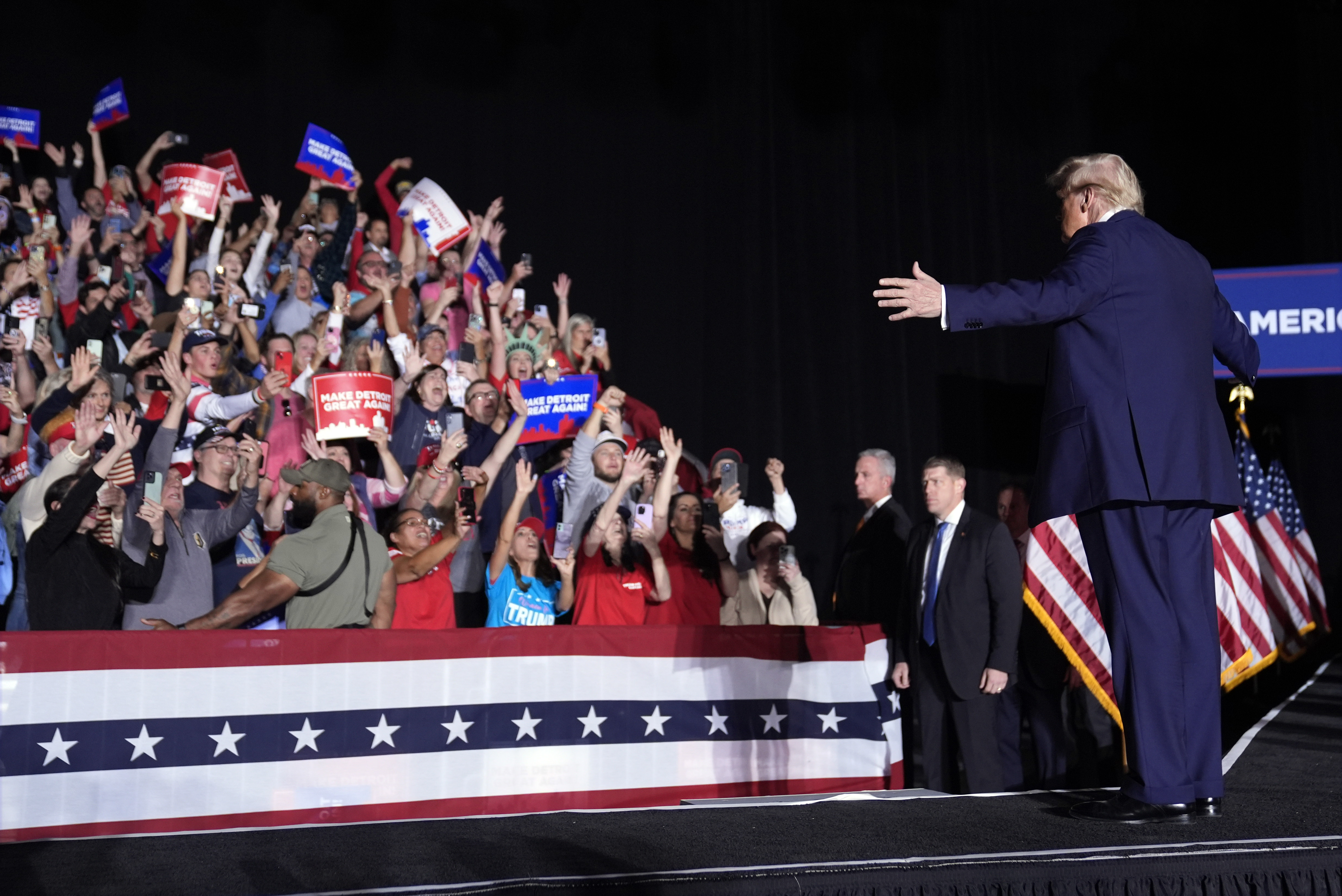 Republican presidential nominee former President Donald Trump arrives at a campaign rally, Friday, Oct. 18, 2024, in Detroit. (AP Photo/Evan Vucci)