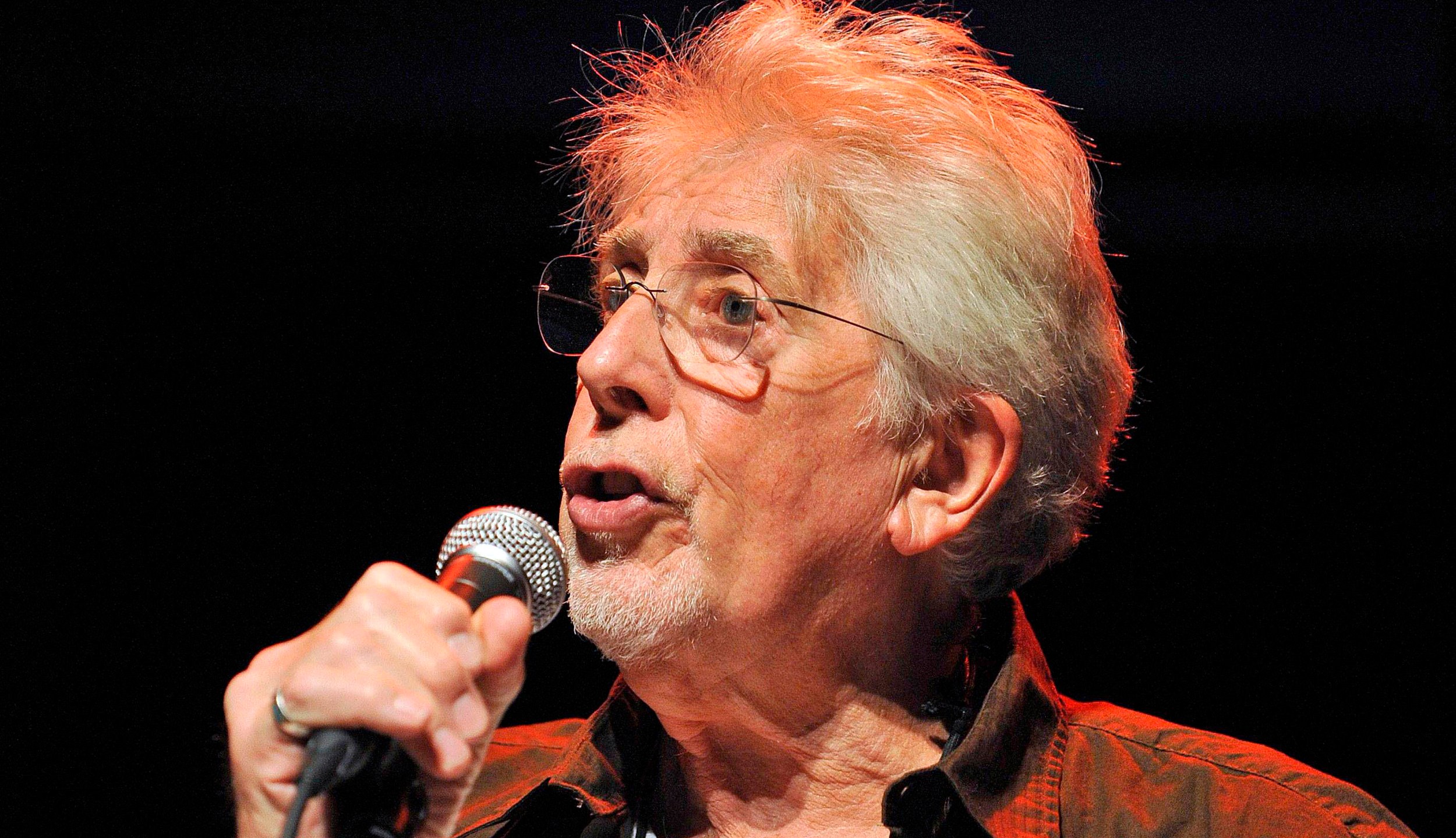 FILE - English blues singer John Mayall performs with his band The Bluesbreakers, on the stage of the Miles Davis hall during the 42nd Montreux Jazz Festival in Montreux, Switzerland, late Monday, July 7, 2008. (Sandro Campardo/Keystone via AP, File)