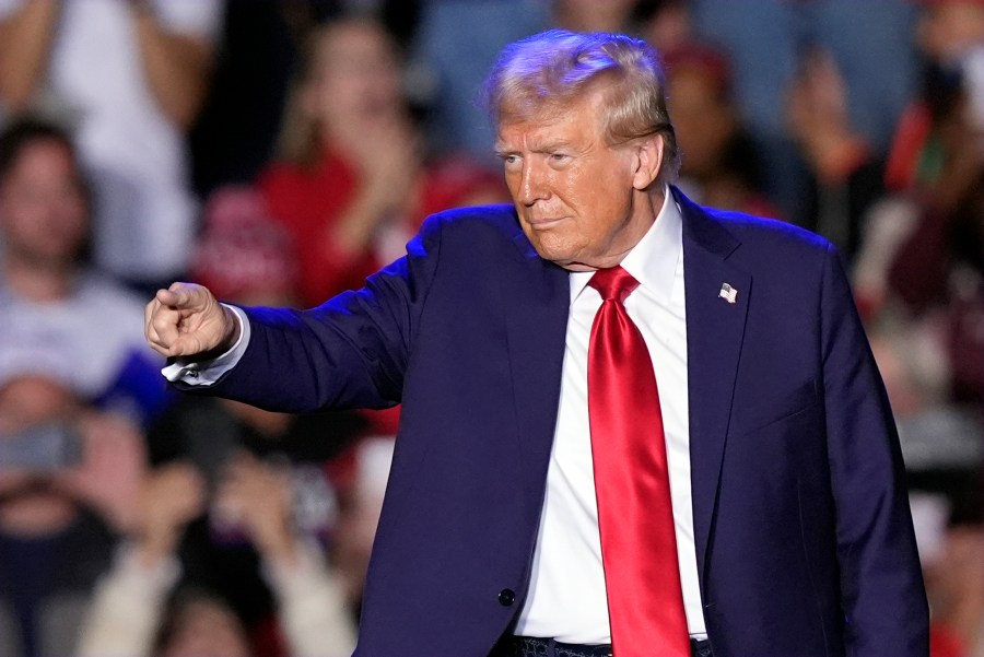 Republican presidential nominee former President Donald Trump gestures at a campaign event, Friday, Oct. 18, 2024, in Detroit. (AP Photo/Carlos Osorio)