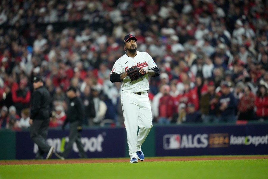 Cleveland Guardians pitcher Emmanuel Clase walks toward the dugout after throwing against the New York Yankees during the ninth inning in Game 4 of the baseball AL Championship Series Friday, Oct. 18, 2024, in Cleveland. (AP Photo/Sue Ogrocki)