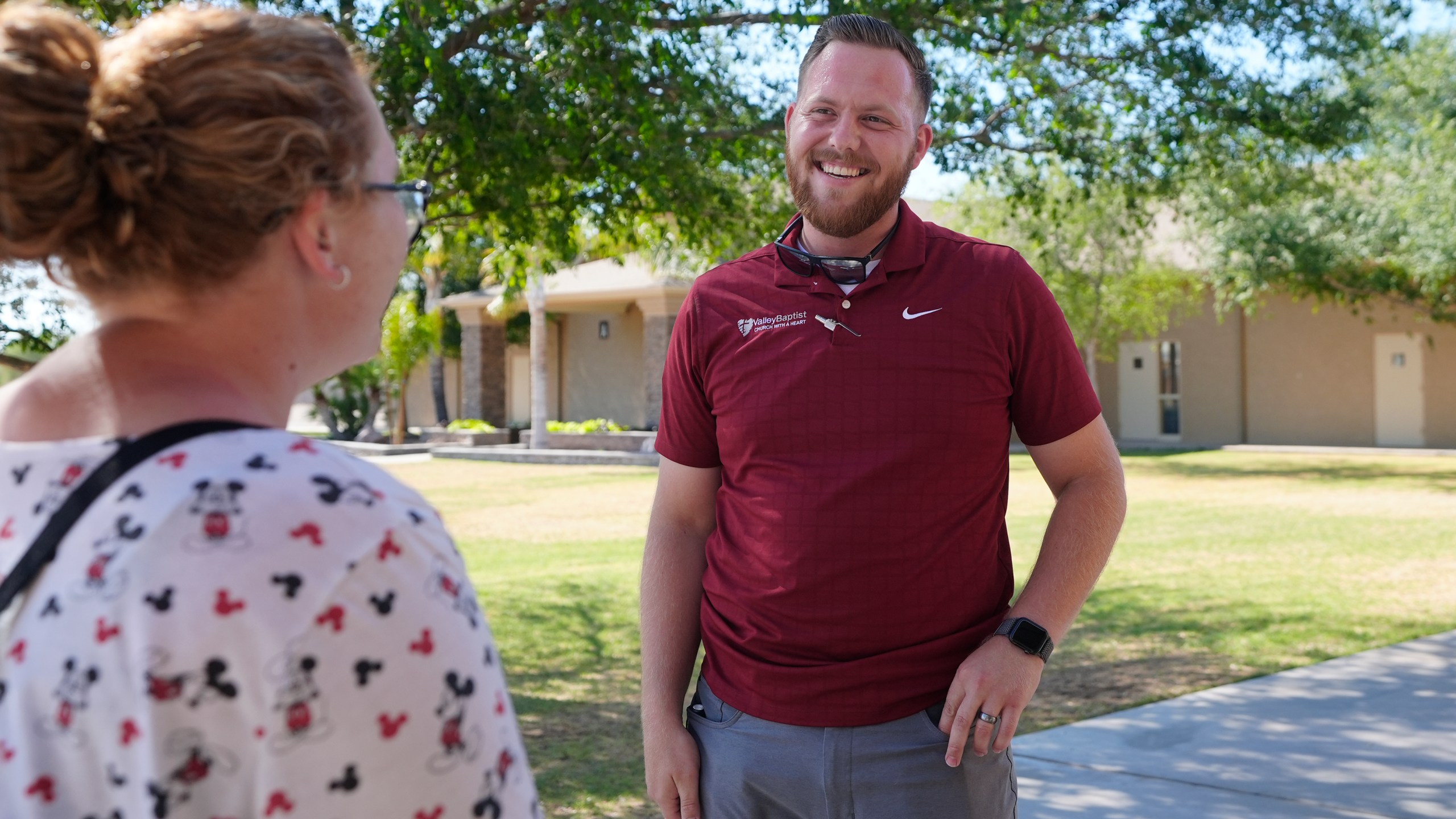 Trevor Cowling speaks with a parishioner at Valley Baptist Church, Tuesday, June 18, 2024, in Mesa, Ariz. (AP Photo/Ross D. Franklin)