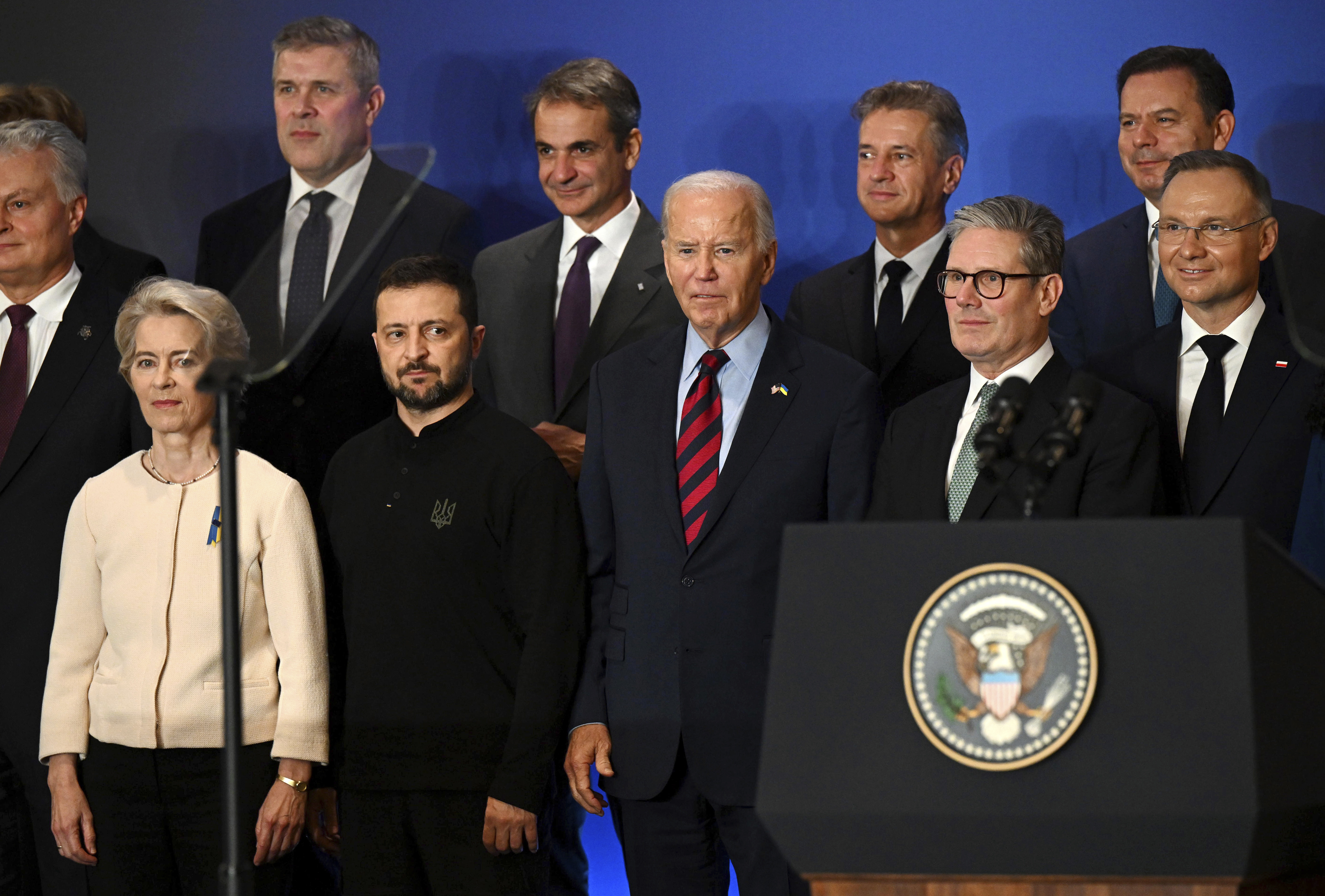 FILE - U.S. President Joe Biden, center, with Ukraine's President Volodymyr Zelenskyy, front second left, President of the European Commission Ursula von der Leyen, front left, Britain's Prime Minister Keir Starmer, front second right, President of Poland Andrzej Duda, right, and other world leaders pose for a family picture of the launching of a Joint Declaration of Support for Ukrainian Recovery and Reconstruction, on Sept. 25, 2024, in New York. (Leon Neal/Pool Photo via AP, File)