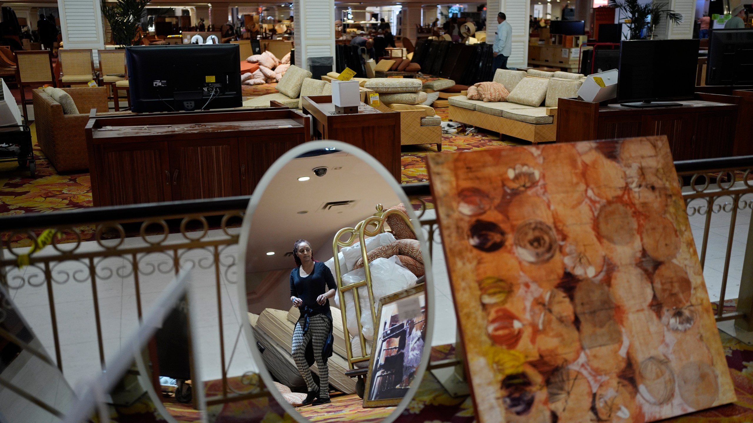 People look at items for sale at the shuttered Tropicana hotel-casino Saturday, May 25, 2024, in Las Vegas. (AP Photo/John Locher)