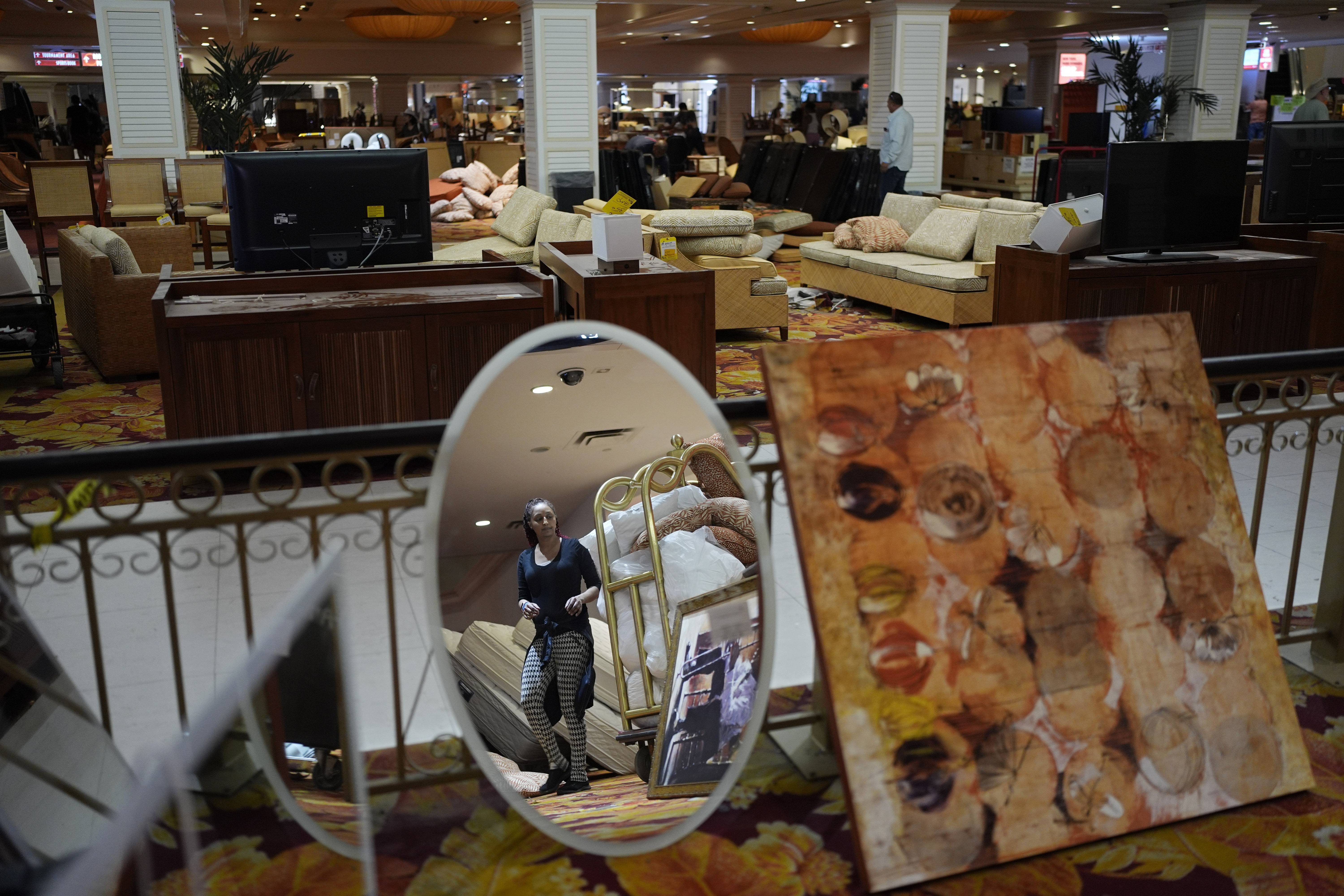 People look at items for sale at the shuttered Tropicana hotel-casino Saturday, May 25, 2024, in Las Vegas. (AP Photo/John Locher)