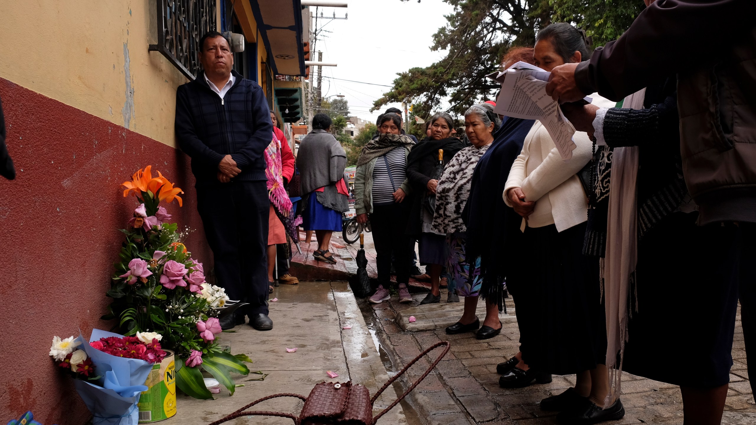 People gather around an altar where Catholic priest Marcelo Perez died in an armed attack after attending mass at a church in San Cristobal de las Casas, Chiapas state, Mexico, Sunday, Oct. 20, 2024. (AP Photo/Isabel Mateos)