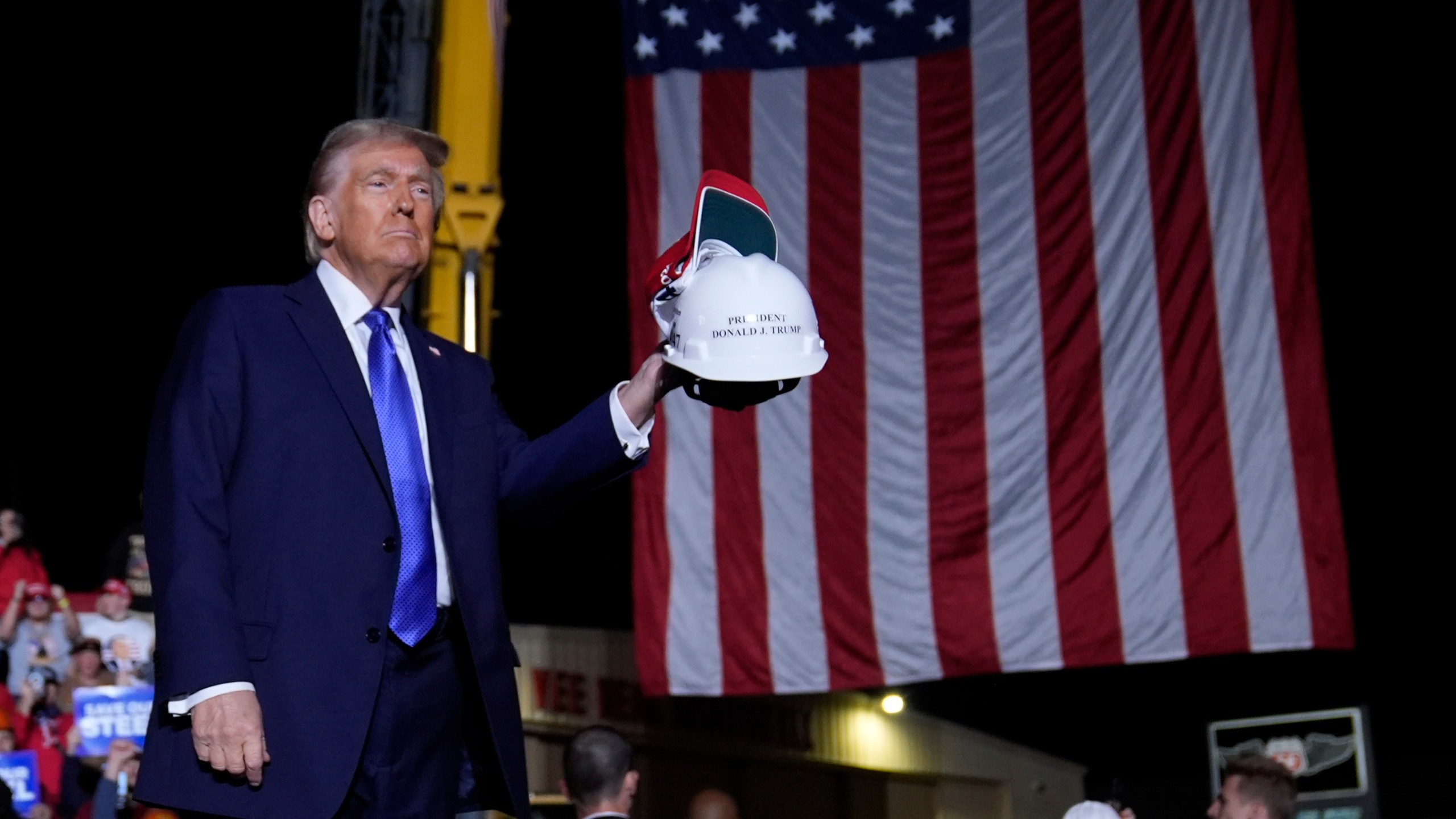 Republican presidential nominee former President Donald Trump gestures at a campaign rally at Arnold Palmer Regional Airport, Saturday, Oct. 19, 2024, in Latrobe, Pa. (AP Photo/Evan Vucci)