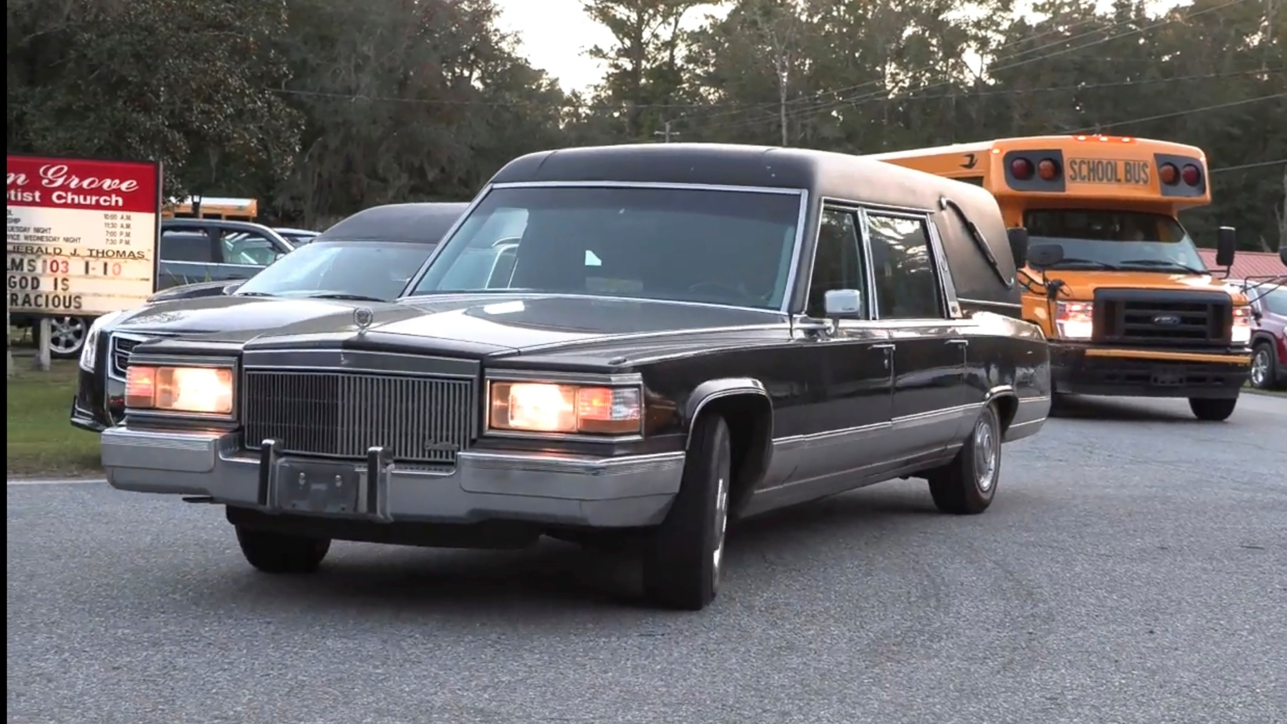 A hearse heads to Meridian Dock in McIntosh county where several people after a gangway collapsed plunging them into the water, on Sapelo Island, Ga in McIntosh county, Sunday, Oct. 20, 2024. (AP Photo/Lewis M. Levine)