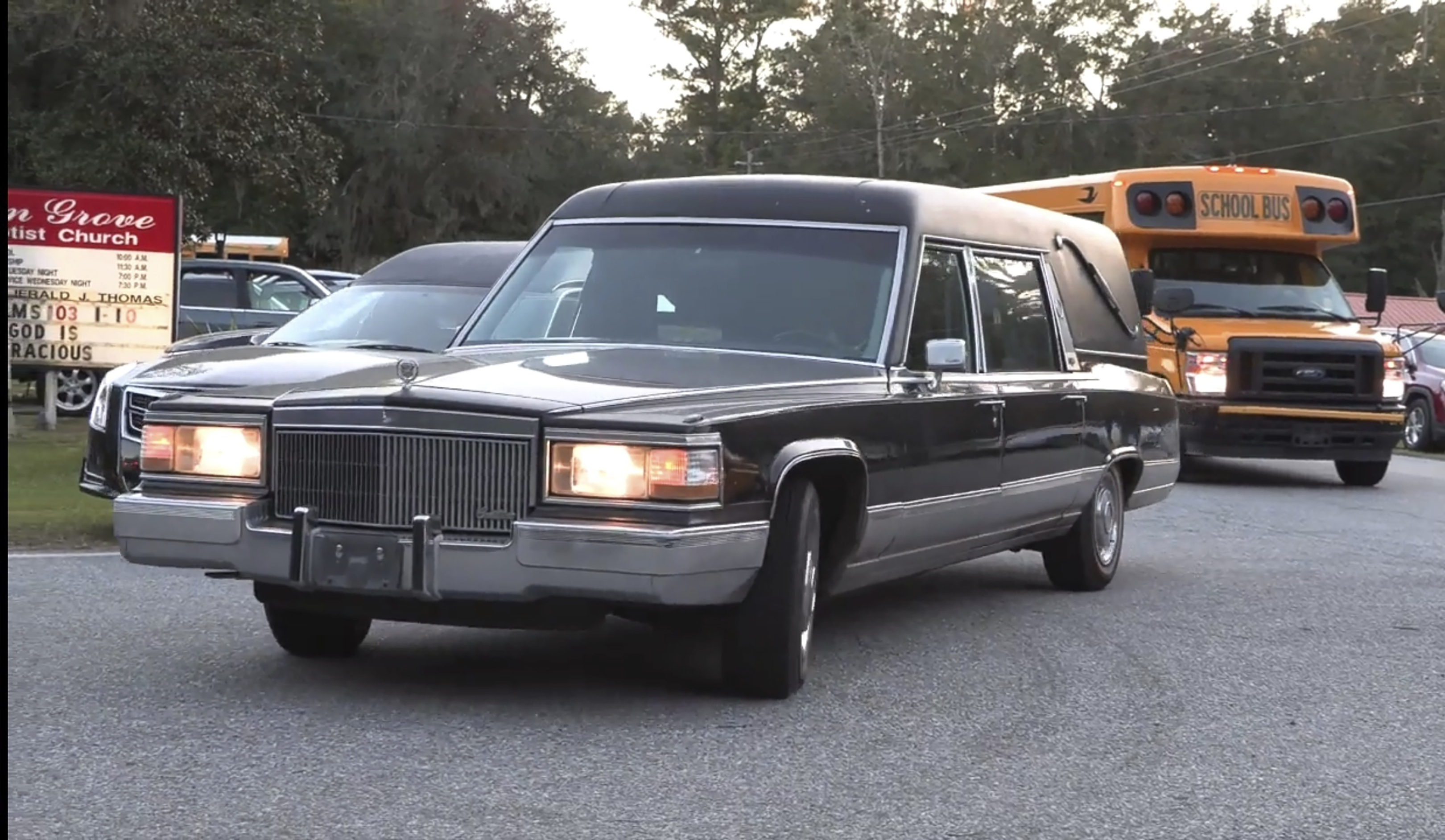 A hearse heads to Meridian Dock in McIntosh county where several people after a gangway collapsed plunging them into the water, on Sapelo Island, Ga in McIntosh county, Sunday, Oct. 20, 2024. (AP Photo/Lewis M. Levine)