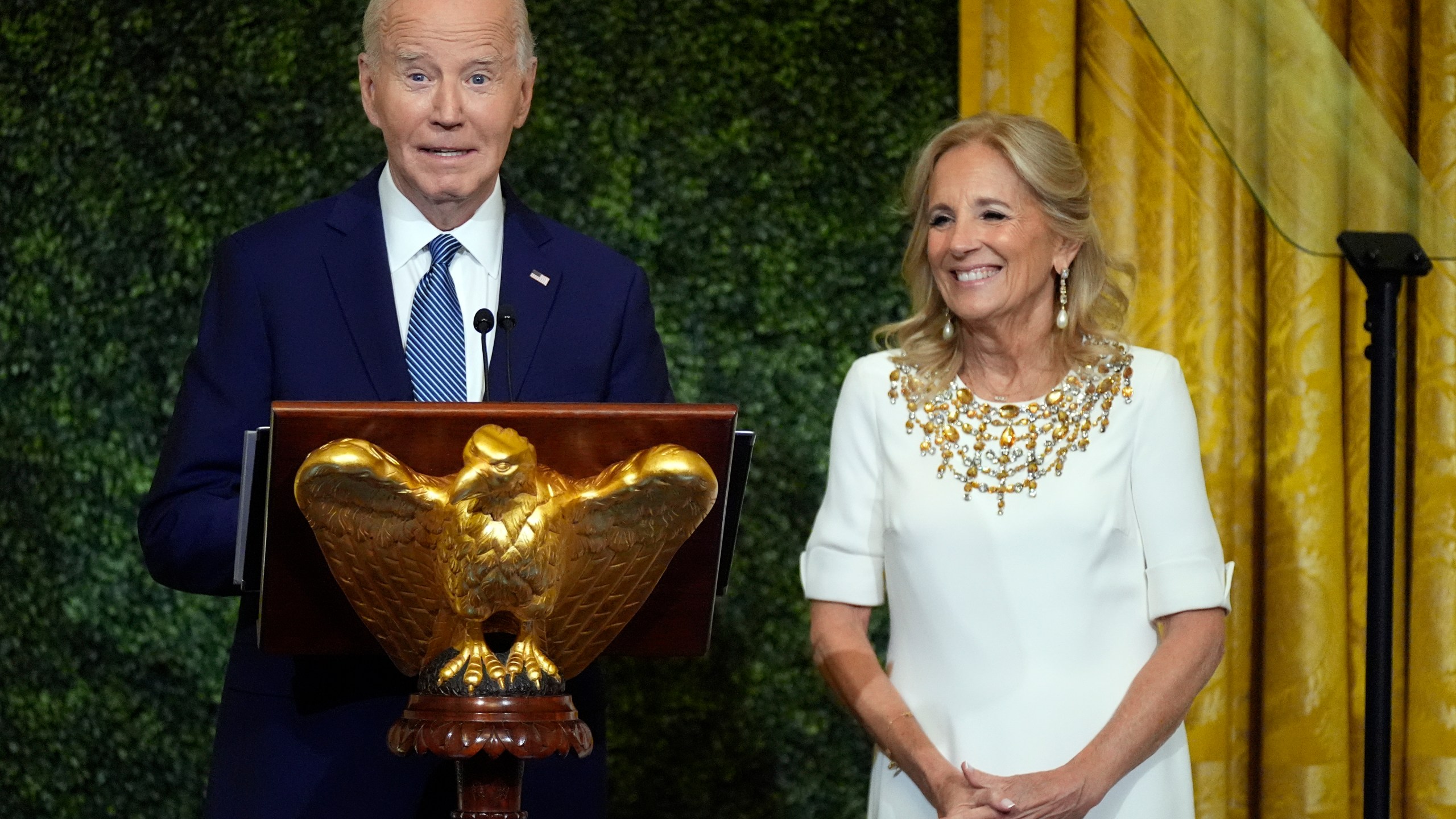 President Joe Biden and first lady Jill Biden speak at a dinner Sunday, Oct. 20, 2024, in the East Room of the White House, celebrating the new enhanced and expanded White House Public tour being unveiled by first lady Jill Biden on Oct. 21, 2024. (AP Photo/Manuel Balce Ceneta)